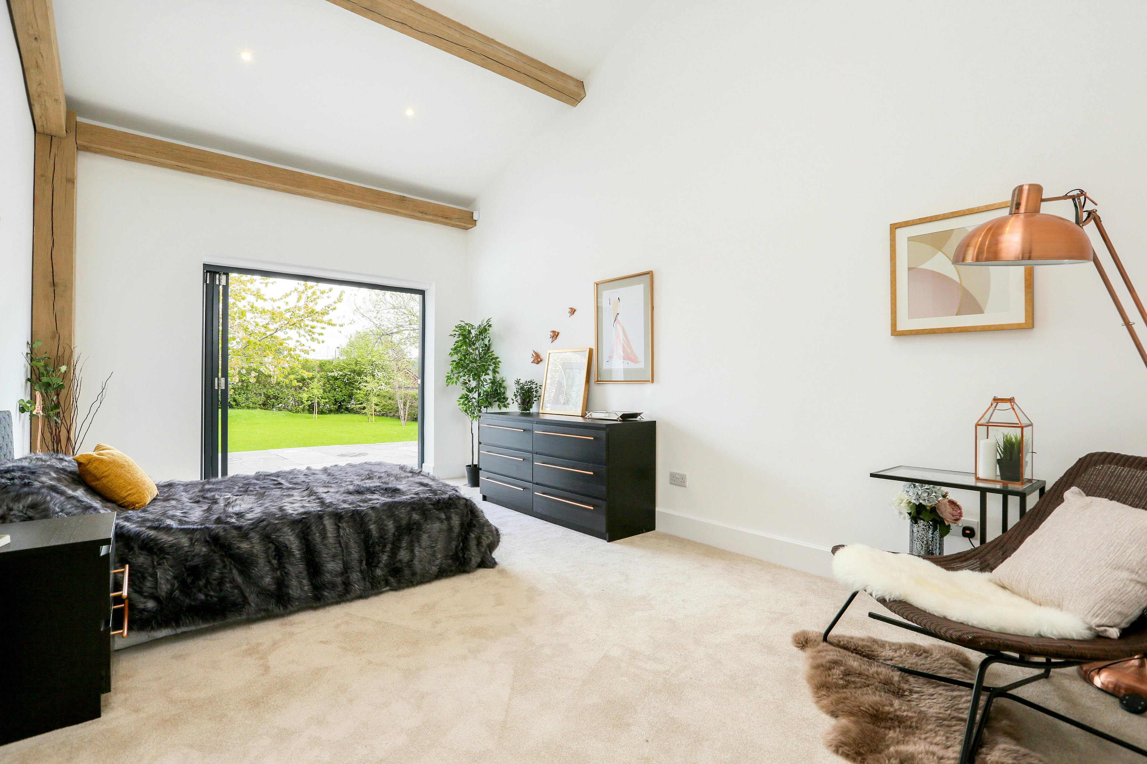 A modern and clean oak framed bedroom