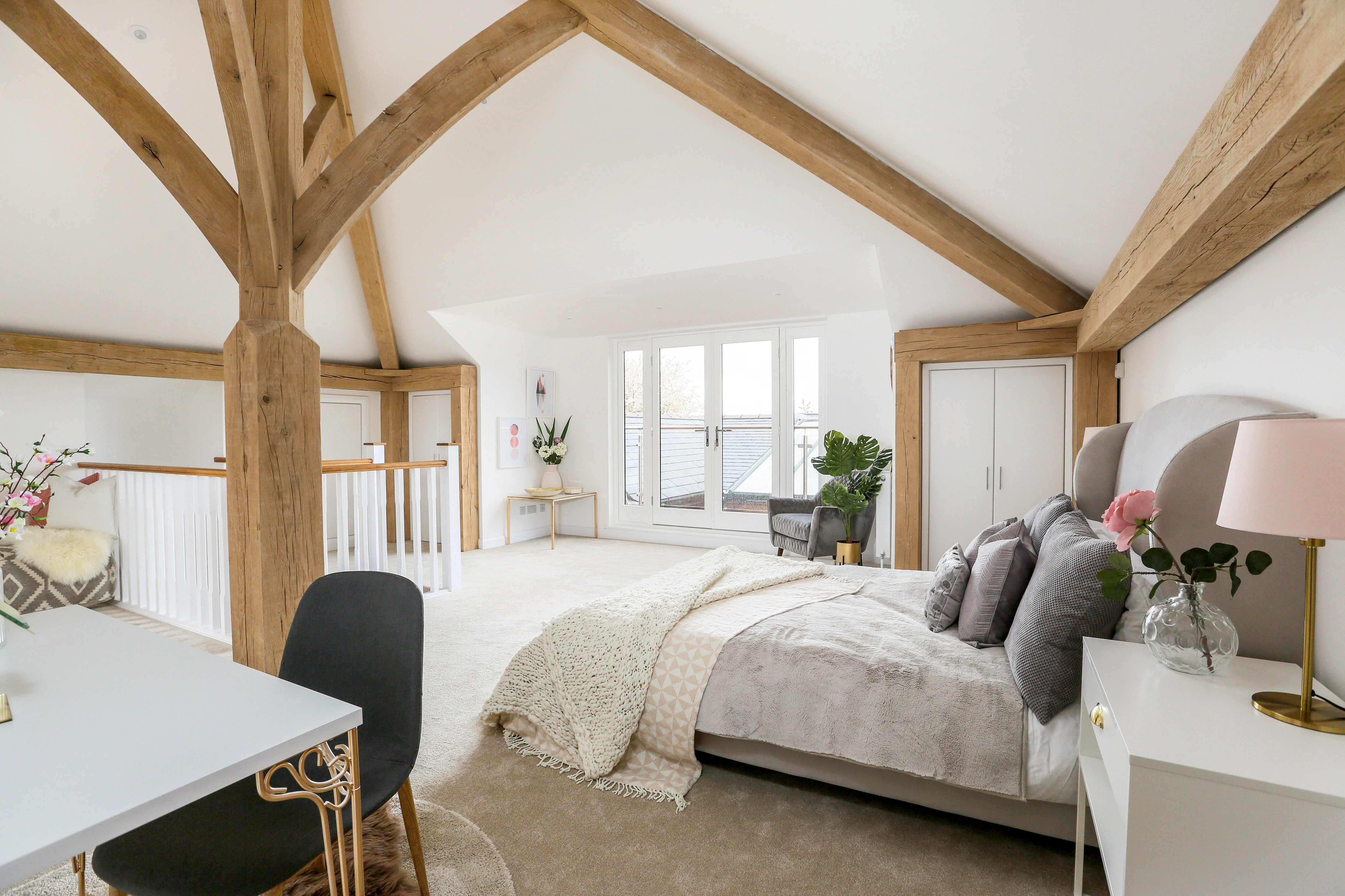 A light and modern oak framed bedroom