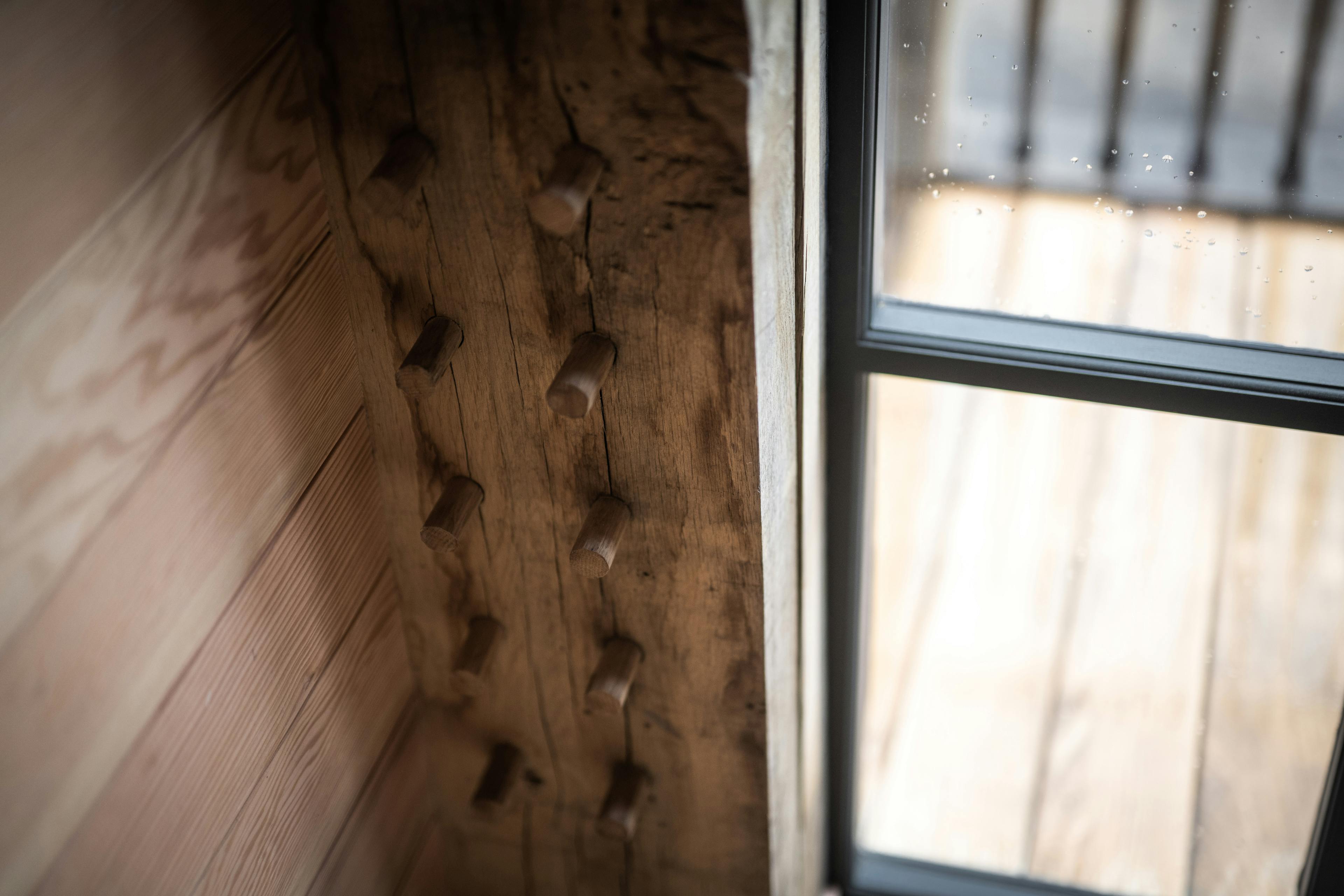 A detail of Douglas fir cladding inside a timber framed boathouse on loch ness