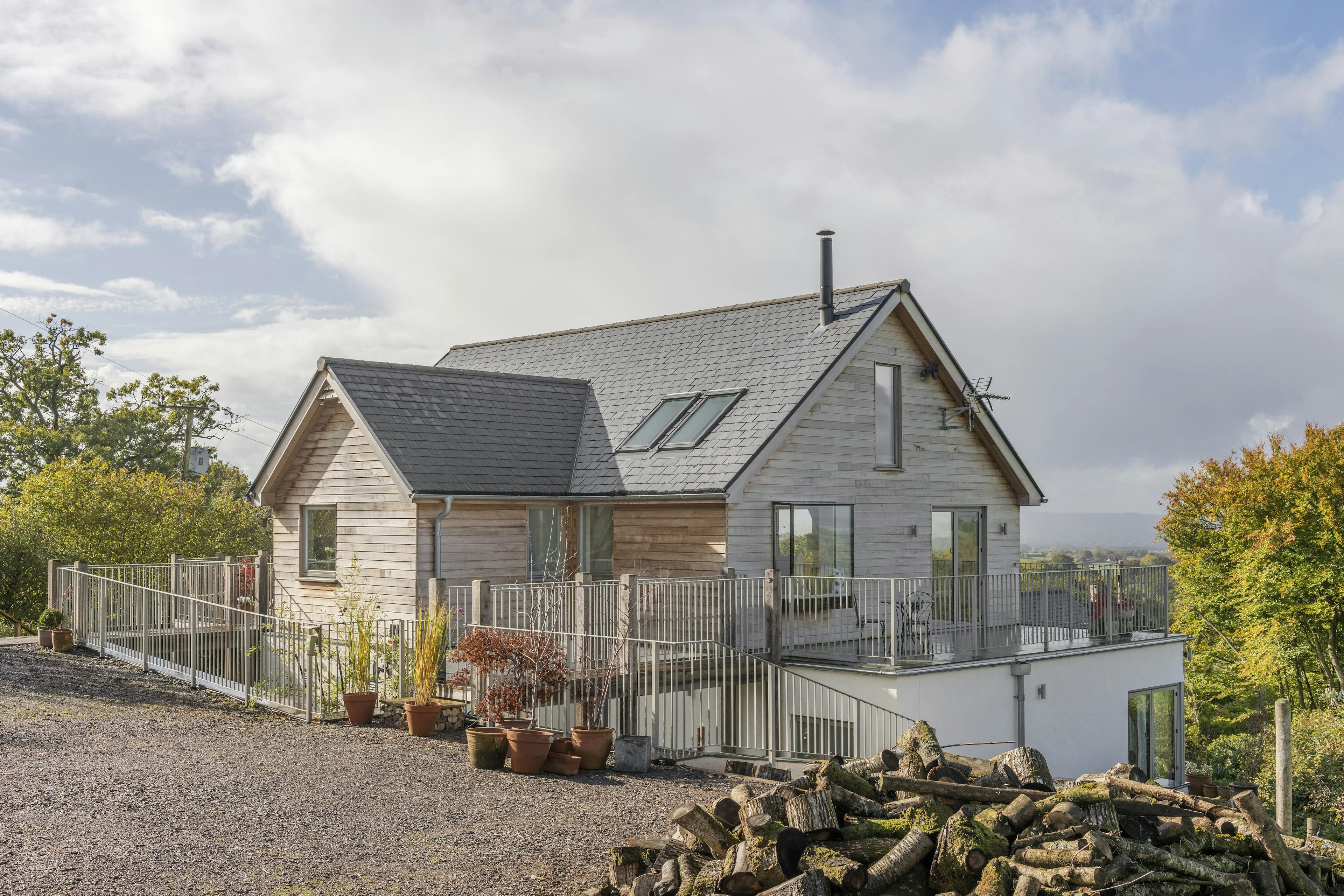 The back of a timber clad oak framed house