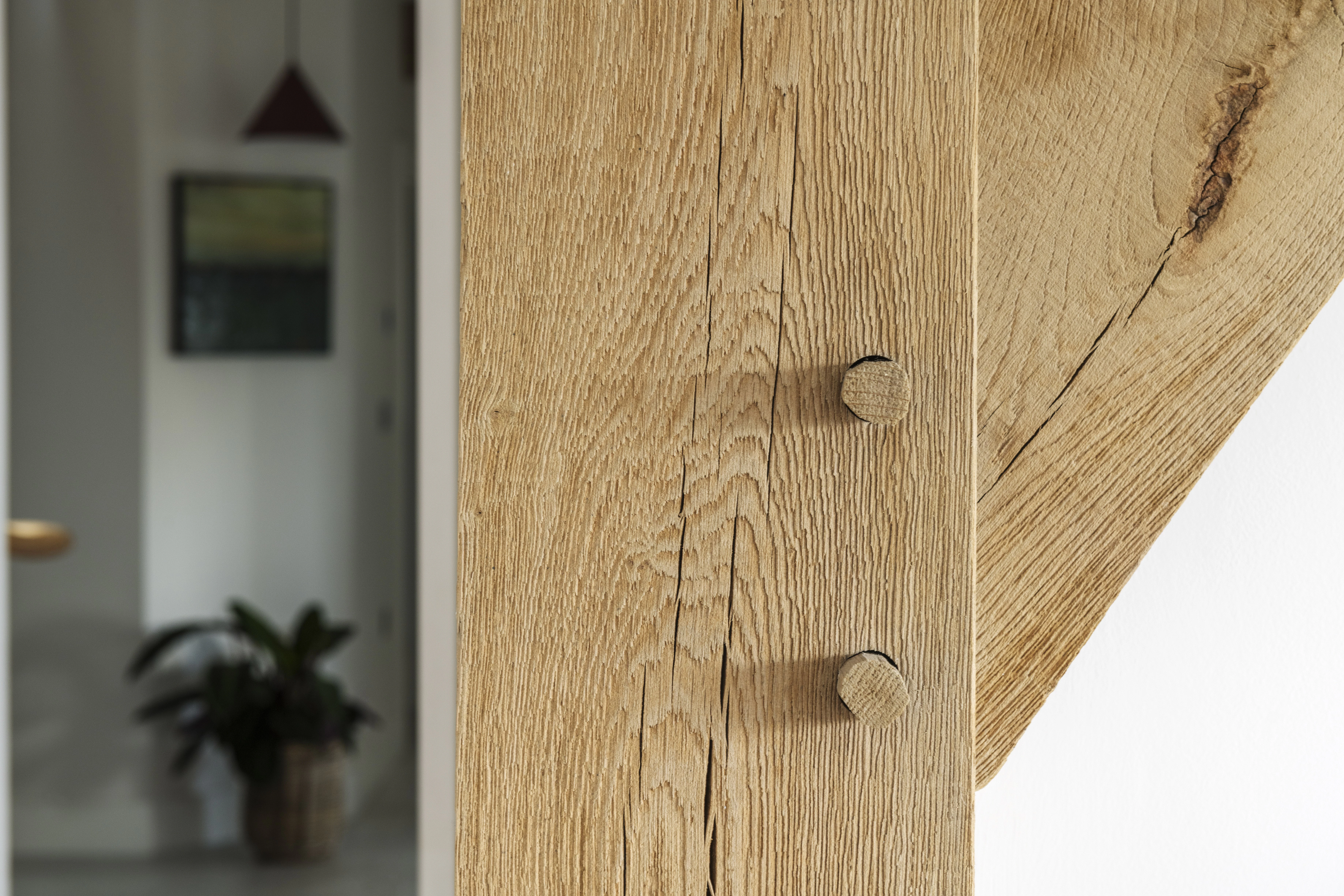 Close up of a post in an oak frame