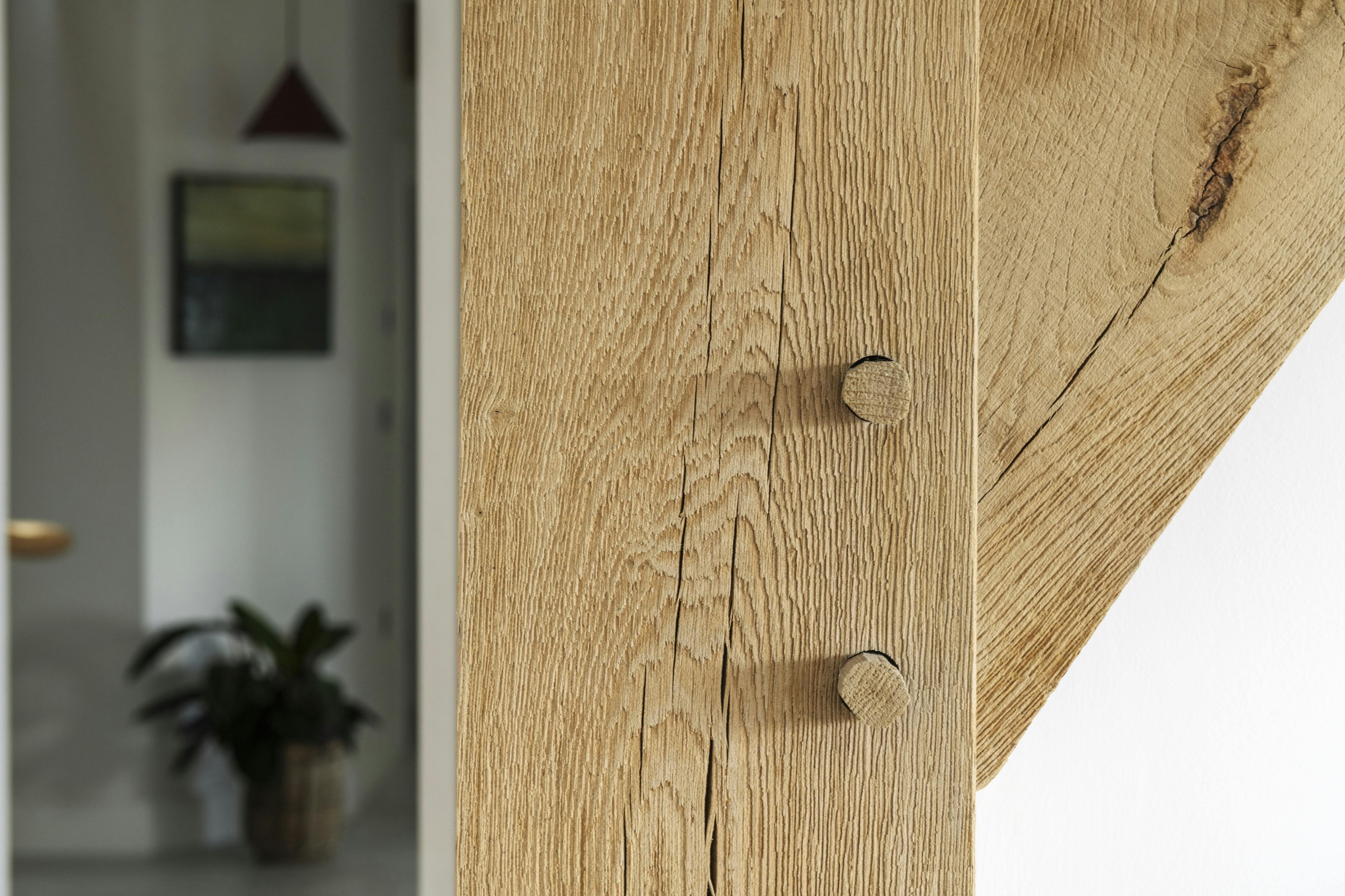 Close up of a post in an oak frame