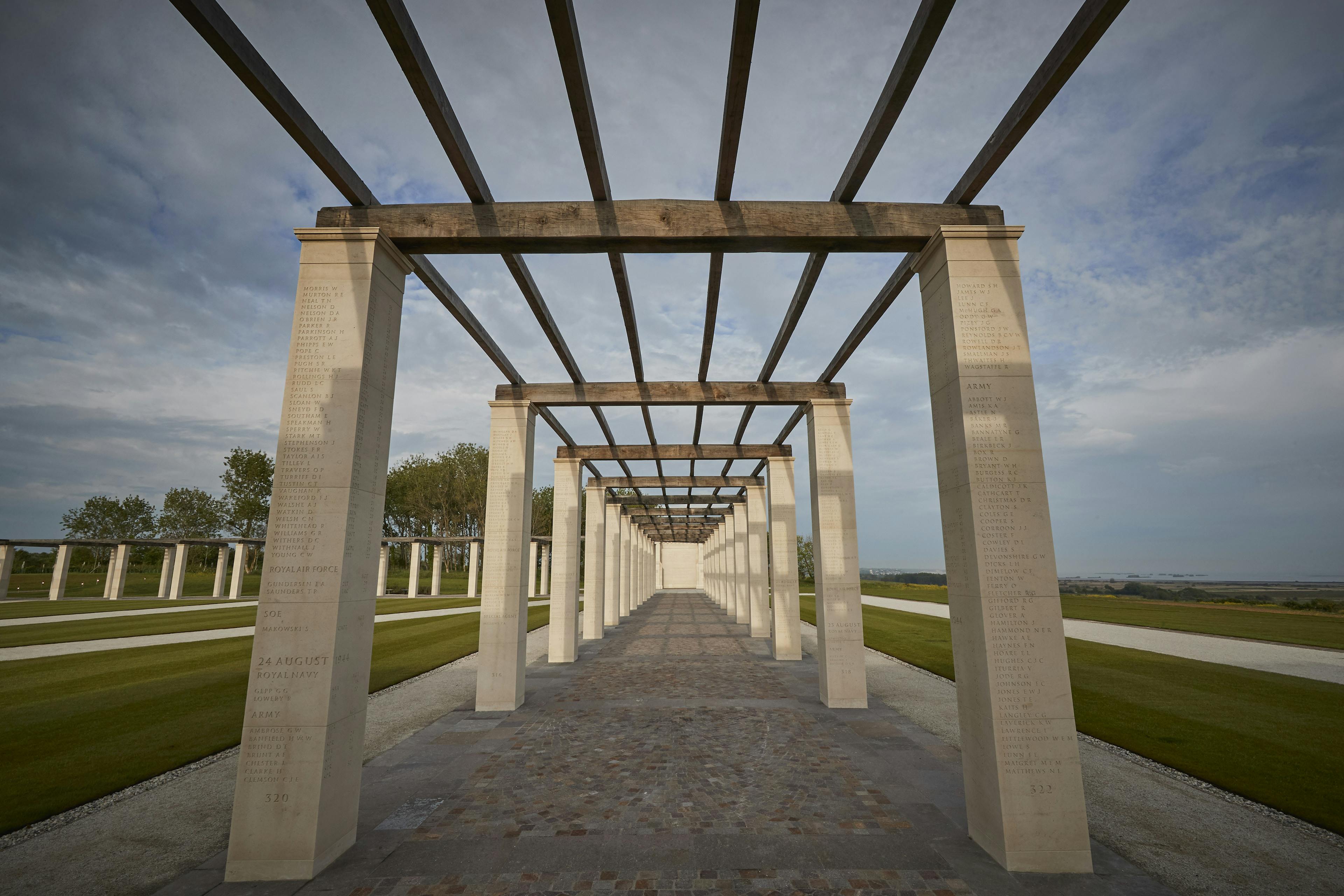Stone columns with an oak pergola at the British Normandy Memorial