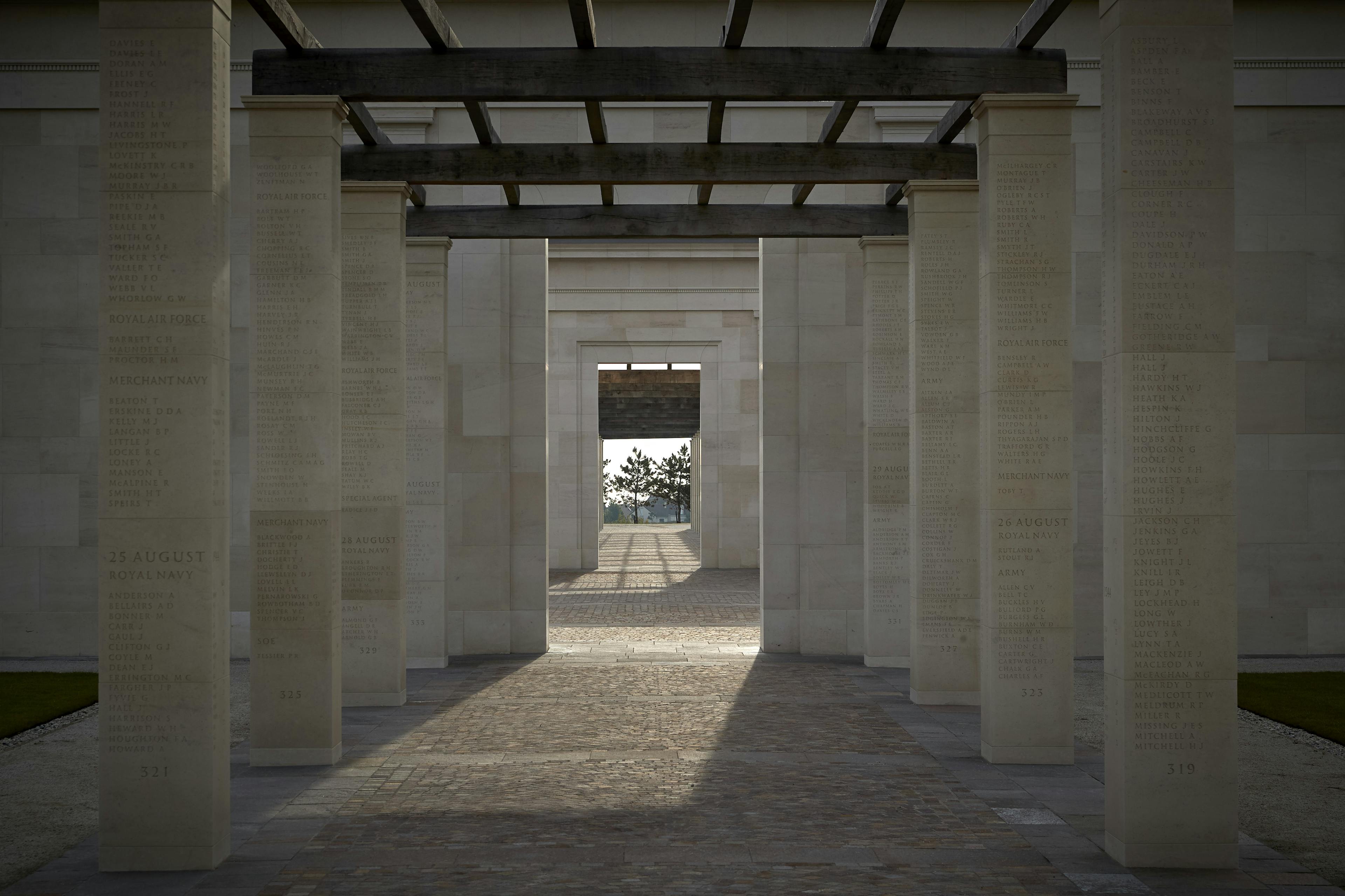 Stone columns with an oak pergola at the British Normandy Memorial