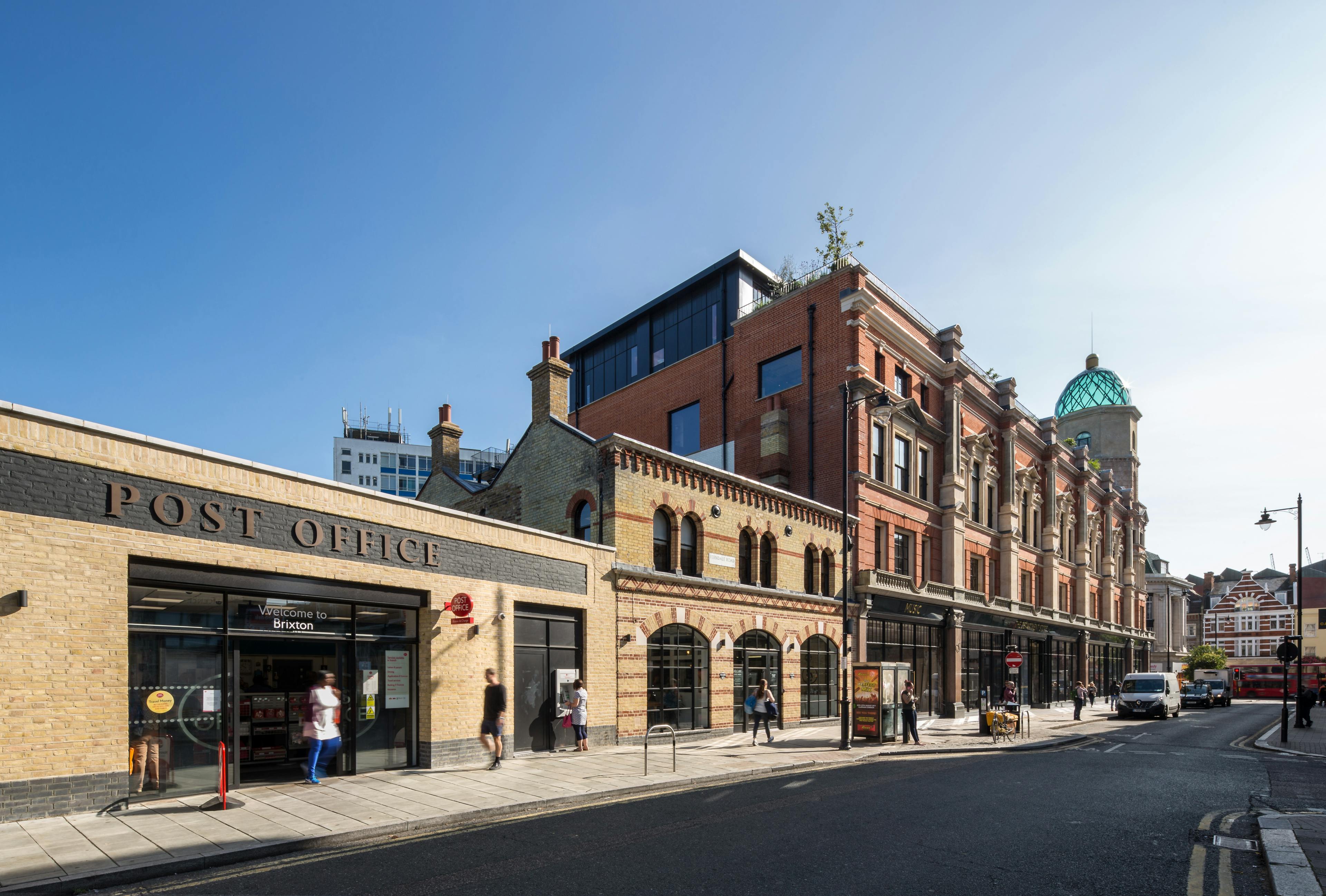 A large refurbished department store on an urban street