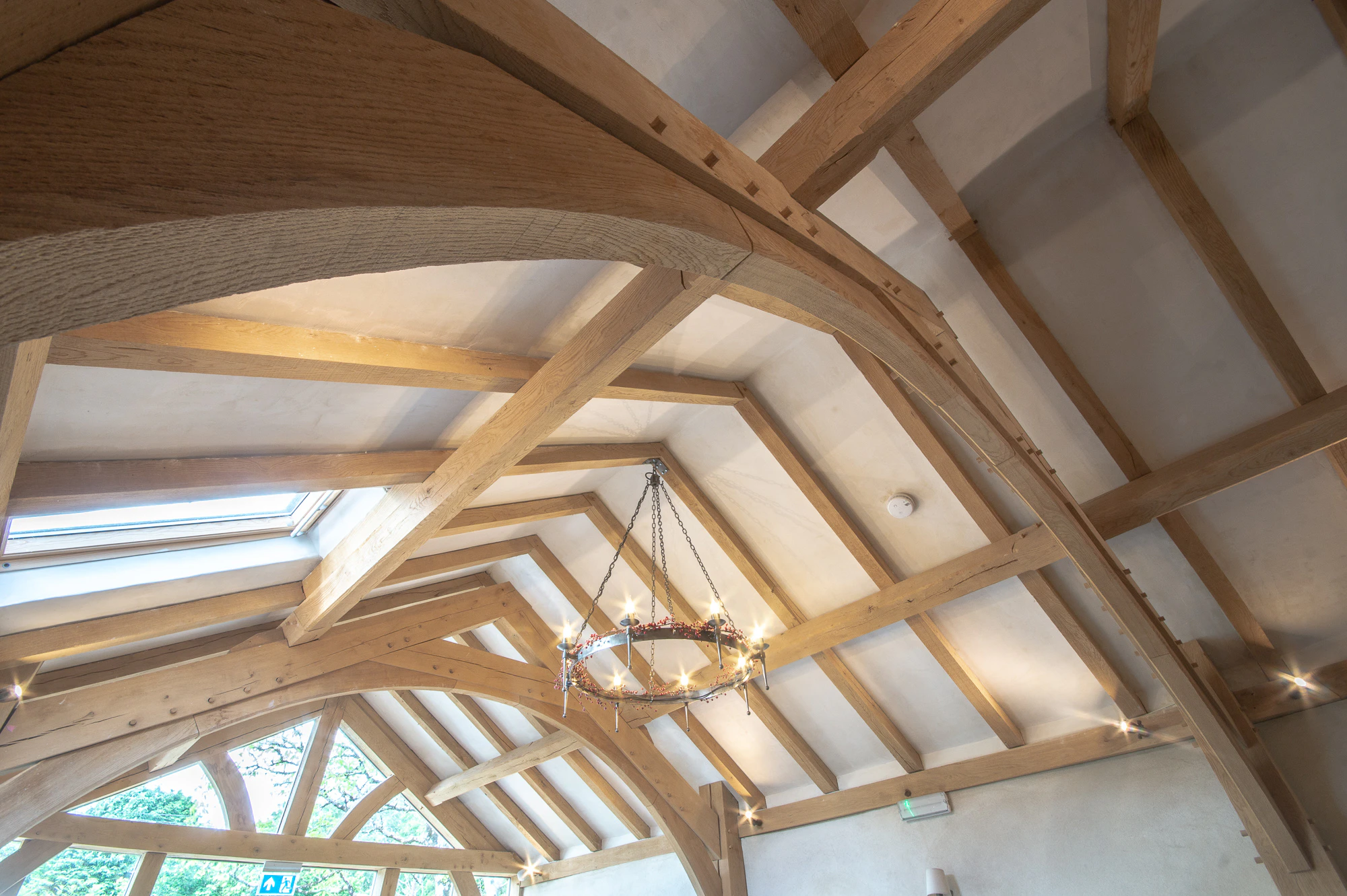 A ceiling of an oak framed dining room extension to a pub