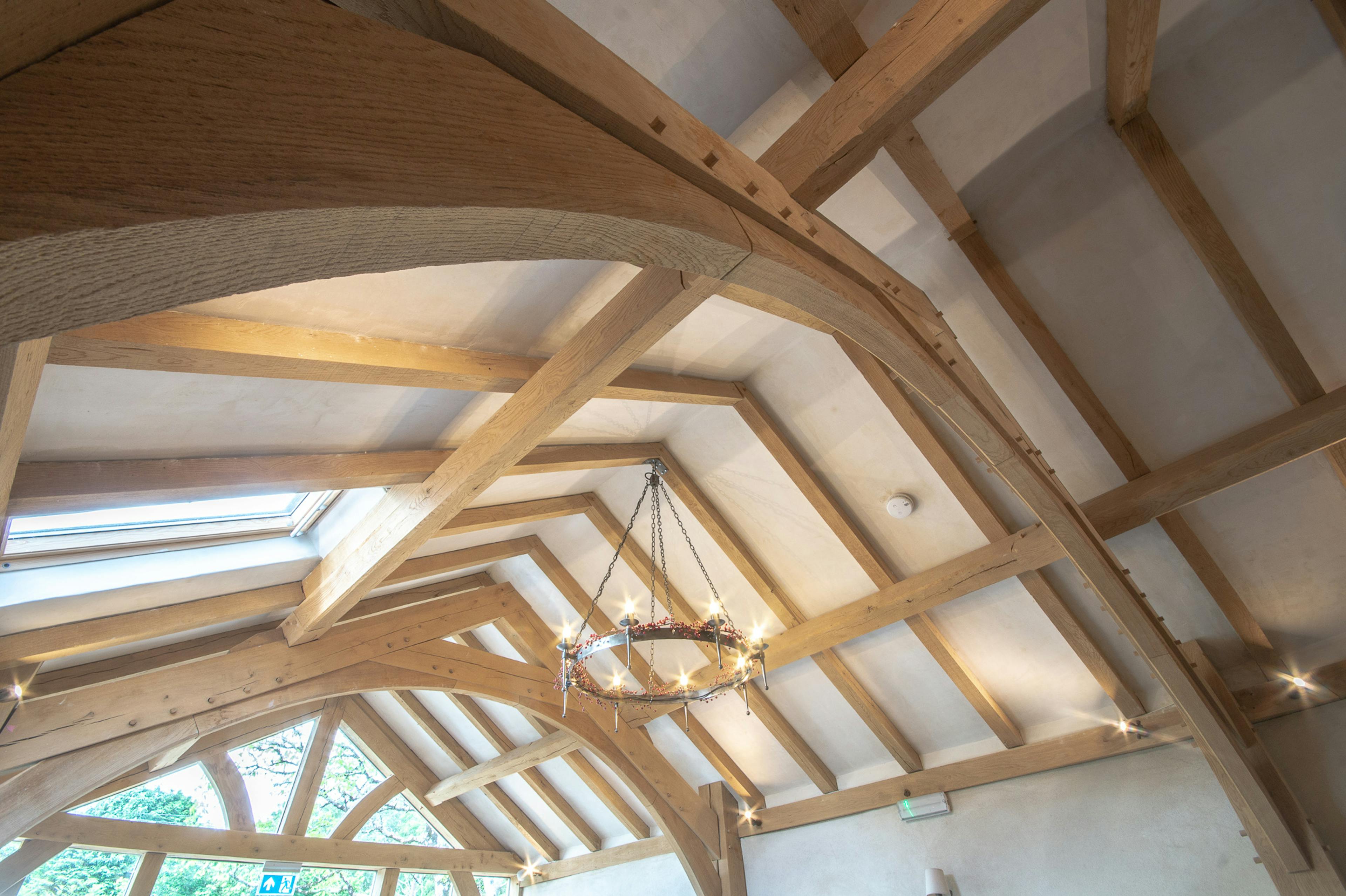 A ceiling of an oak framed dining room extension to a pub
