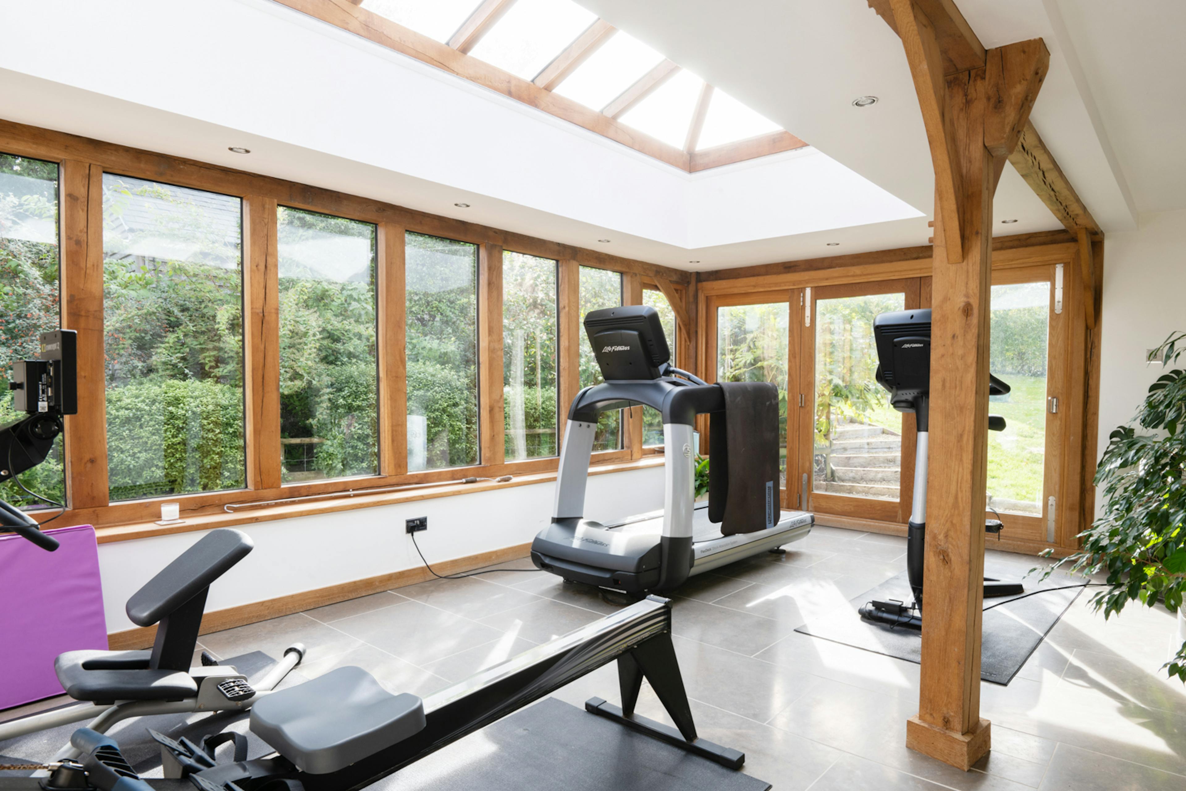 An oak framed gym with a roof lantern