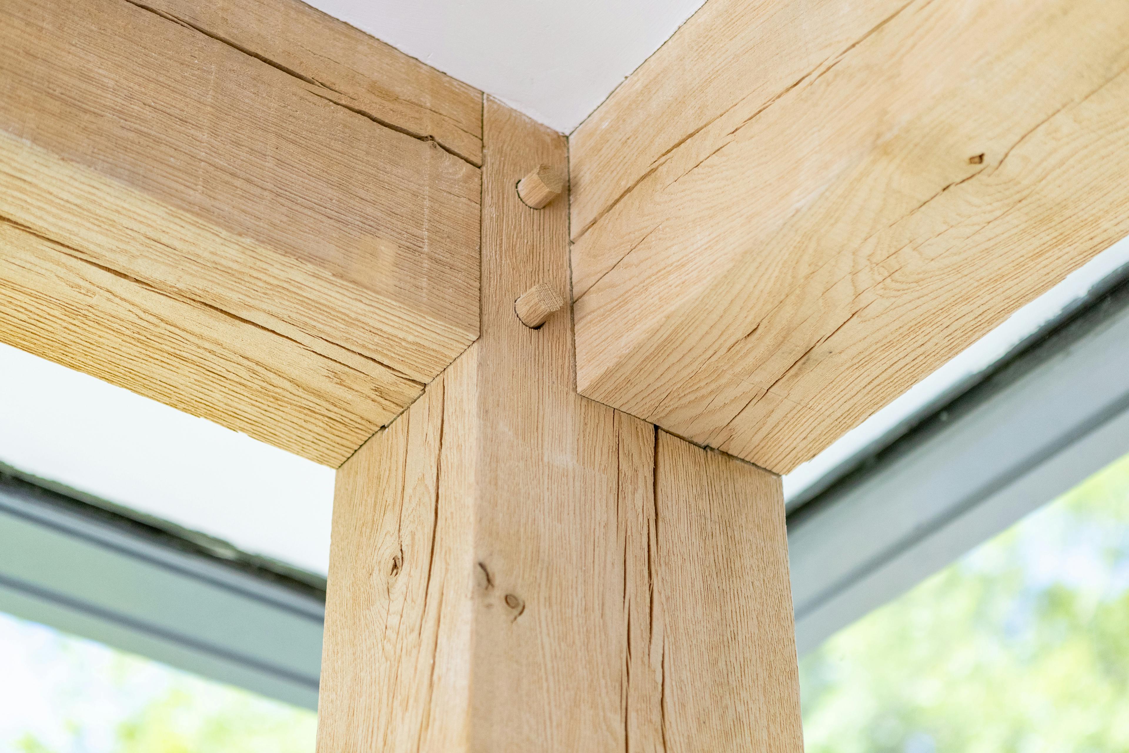 A close up of a joint in an oak frame