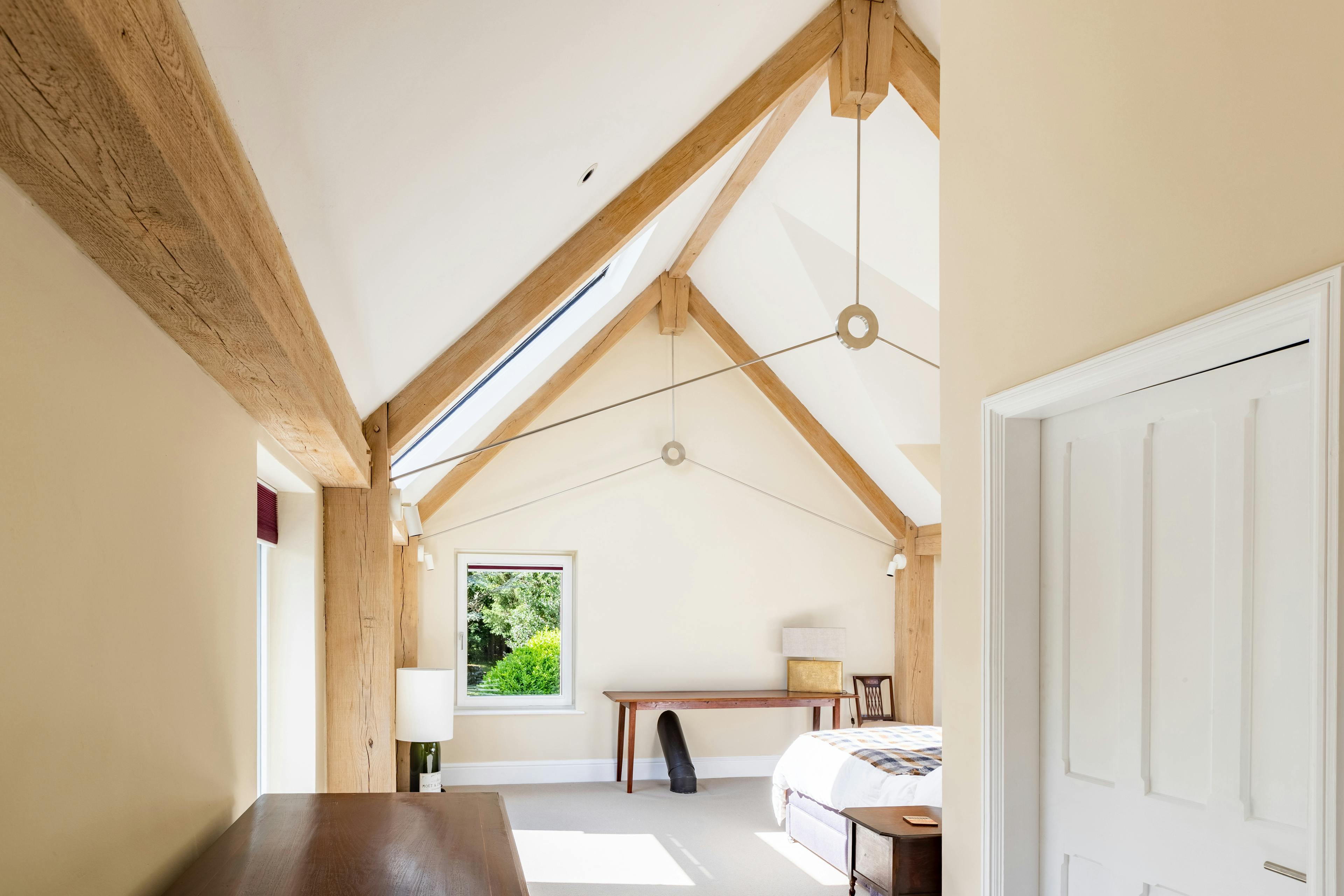 An oak framed bedroom with steel tie connections