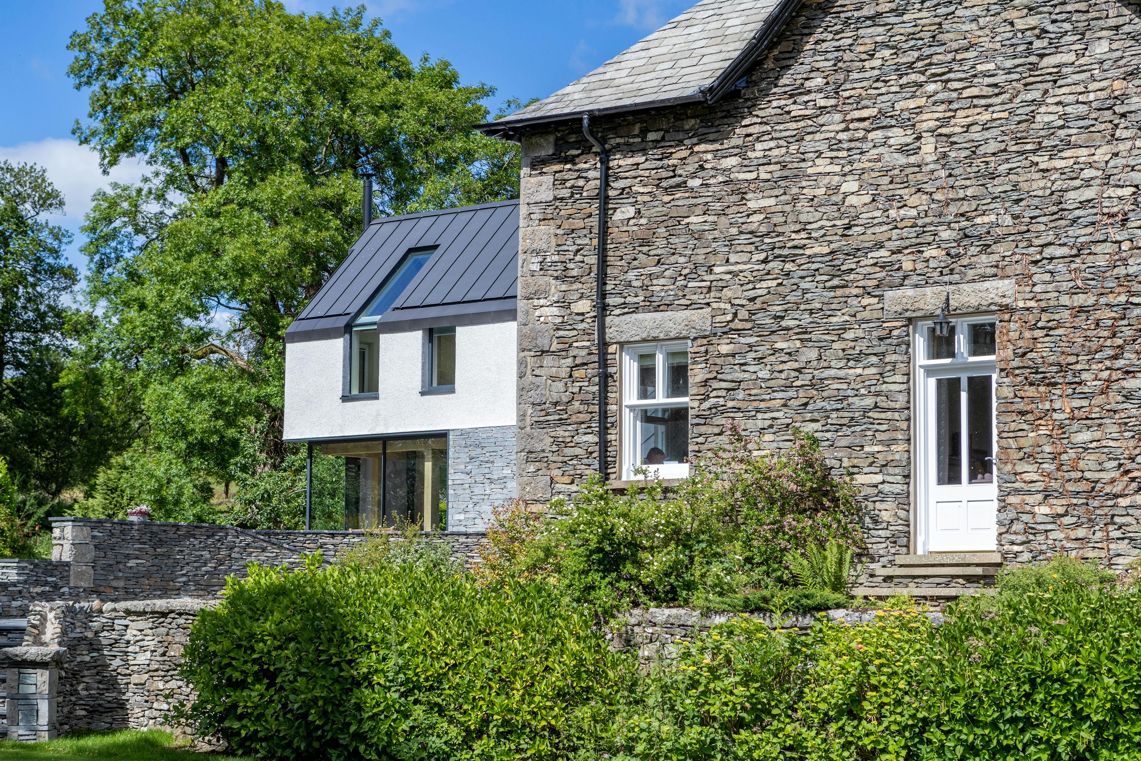 An oak frame living room extension to an Edwardian vicarage