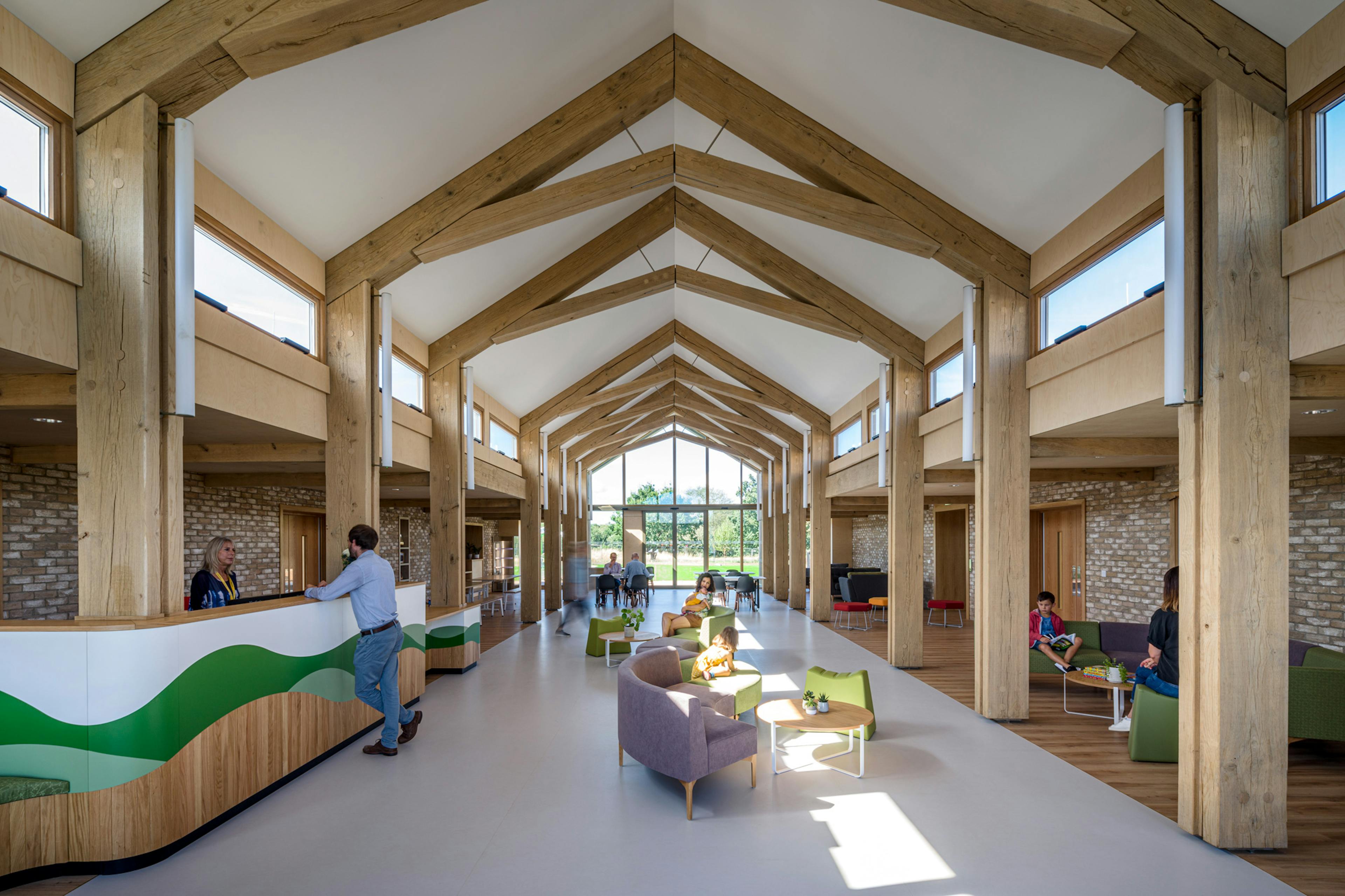 A children's hospital with a large portal oak framed atrium