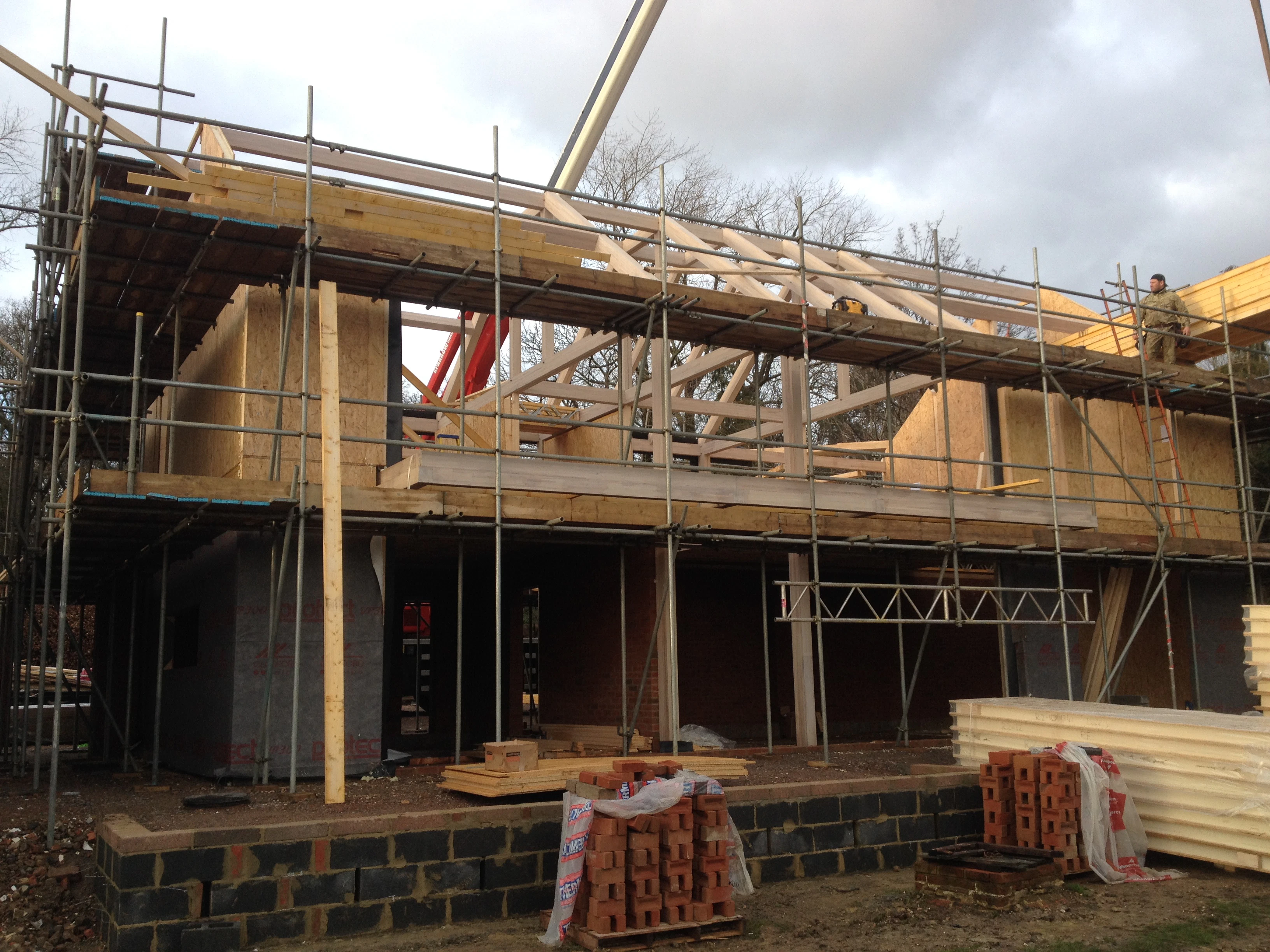 Construction of an oak glulam frame house with sips panels
