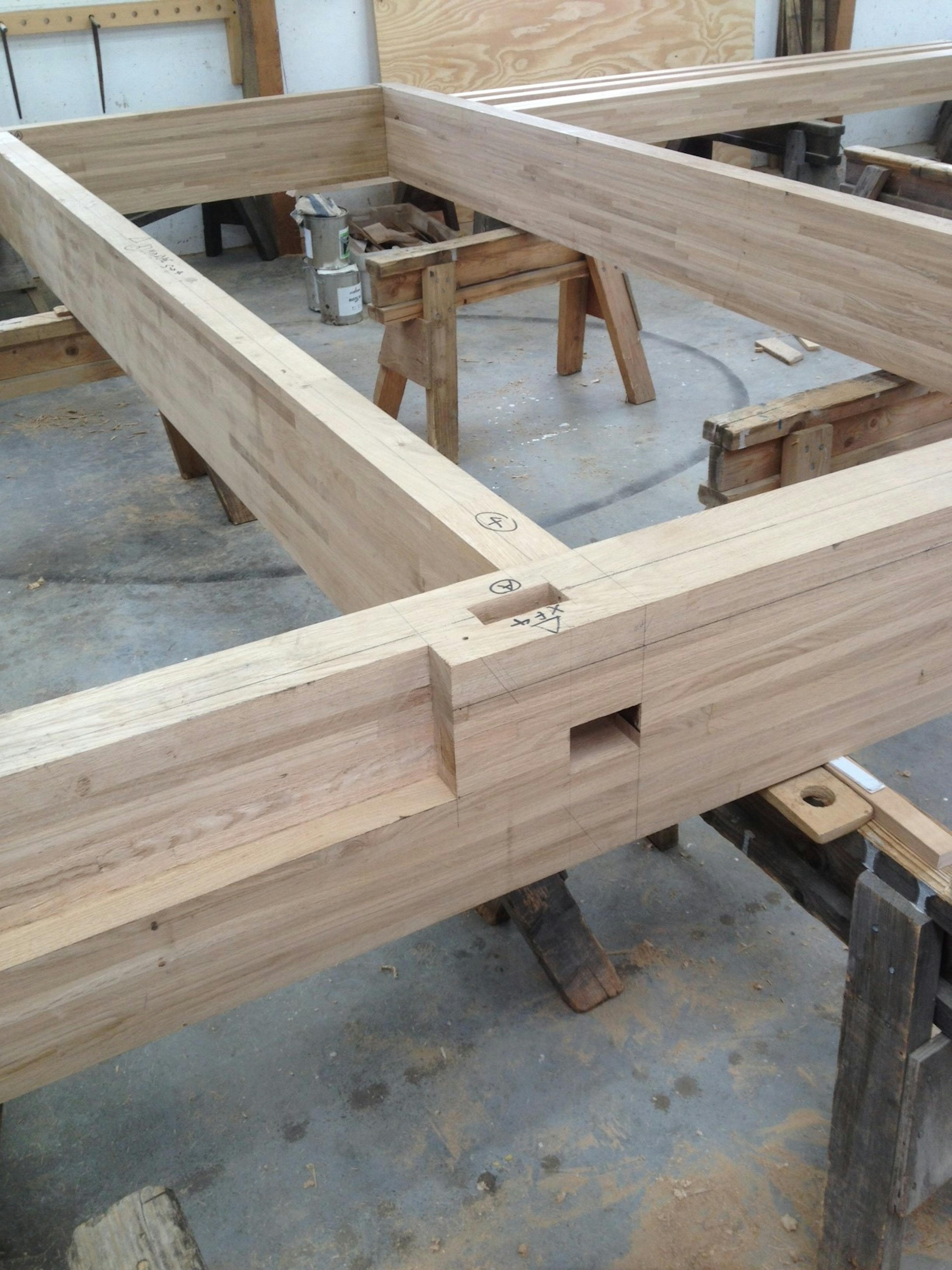 An oak glulam frame being made in a workshop