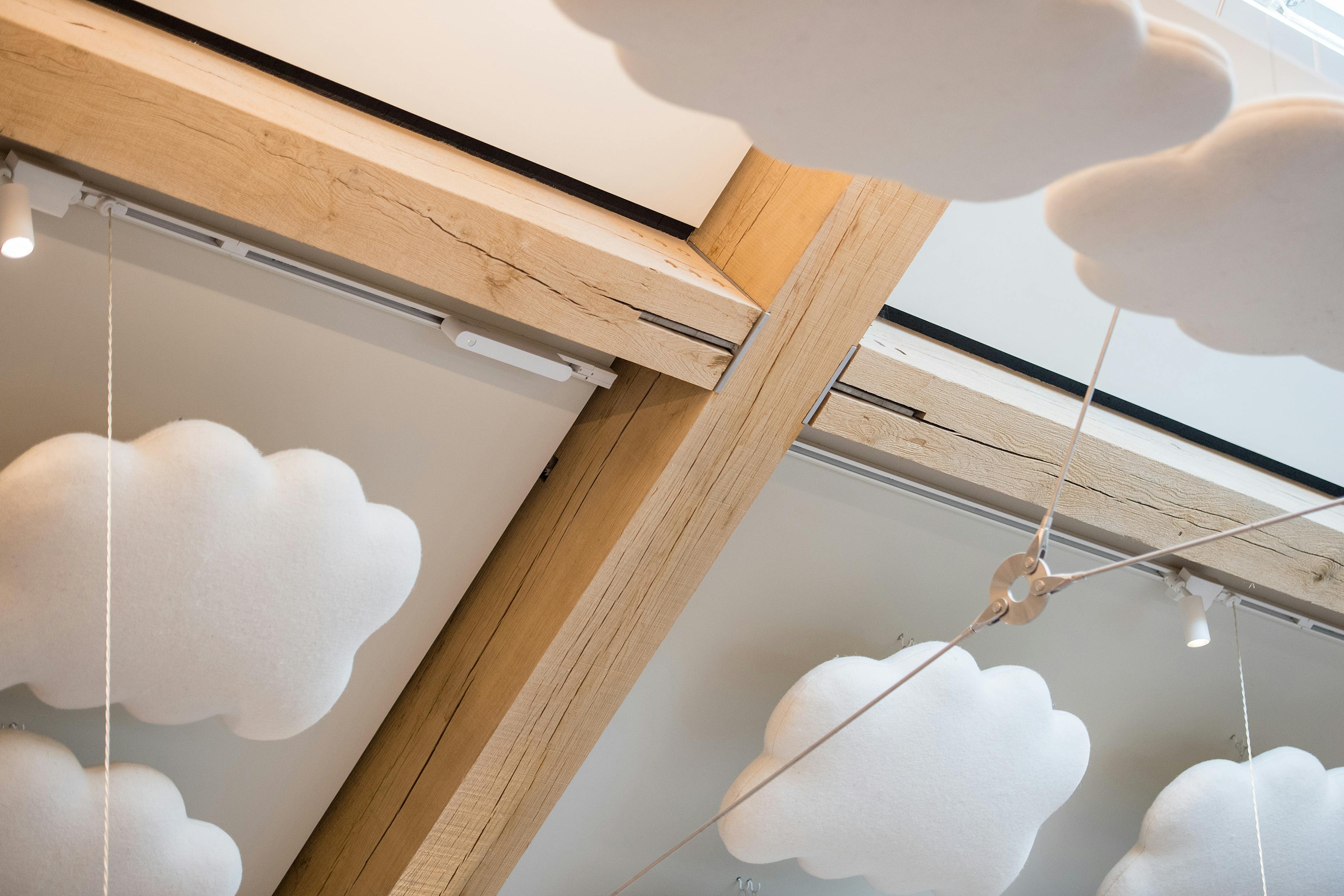 The ceiling of the Grange Hearing Dogs oak and steel framed gift shop showing a steel tie rod
