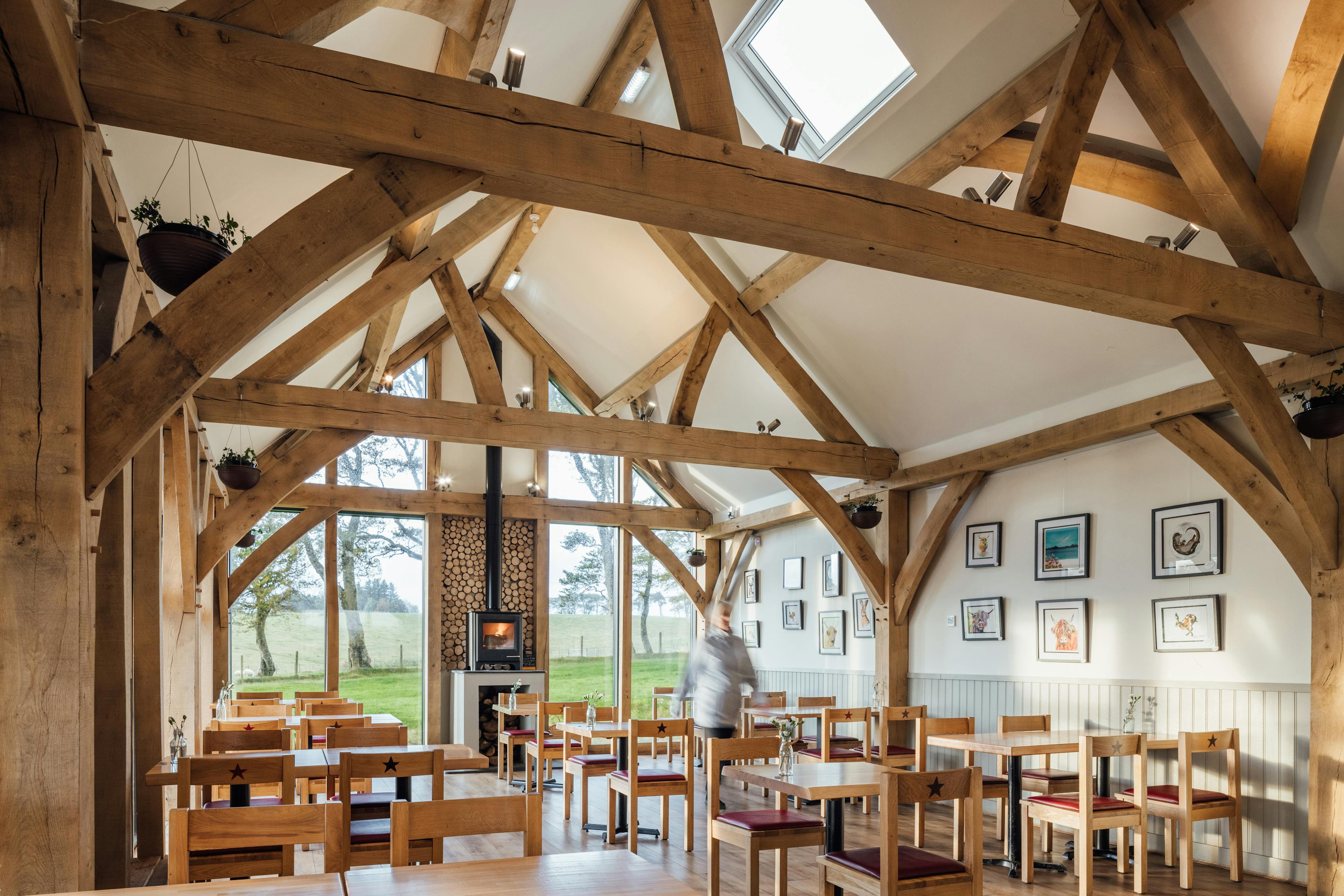 An oak framed cafe with a vaulted ceiling