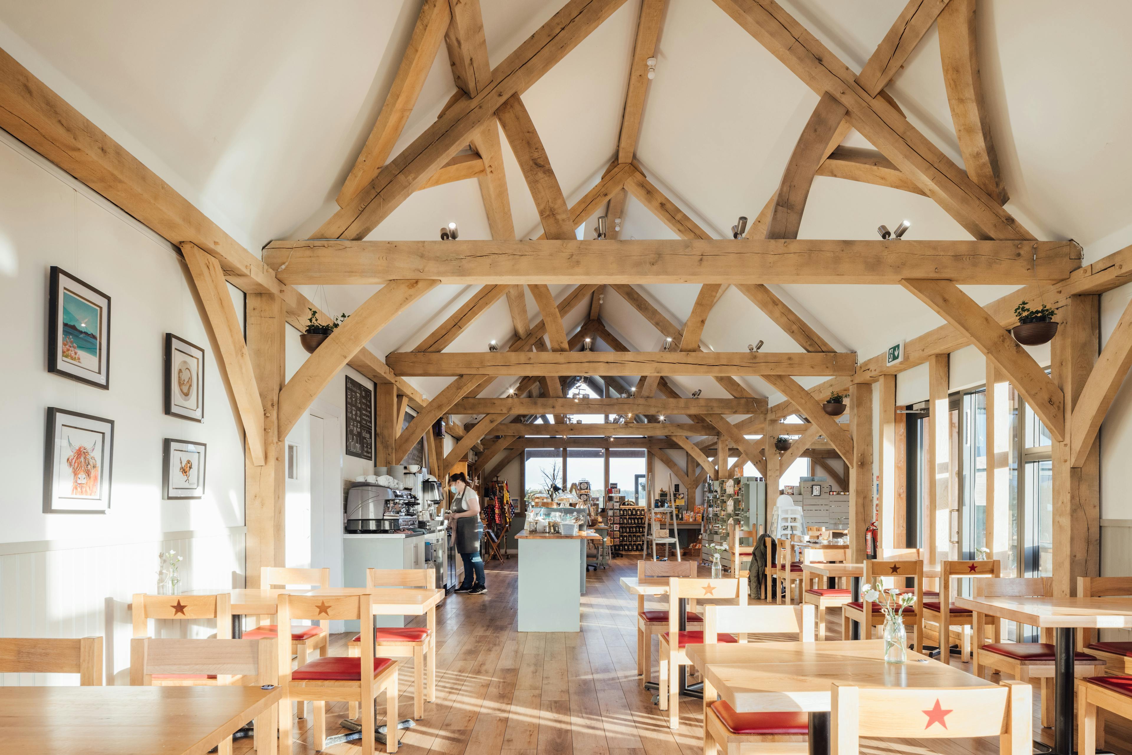 An oak framed cafe with a vaulted ceiling