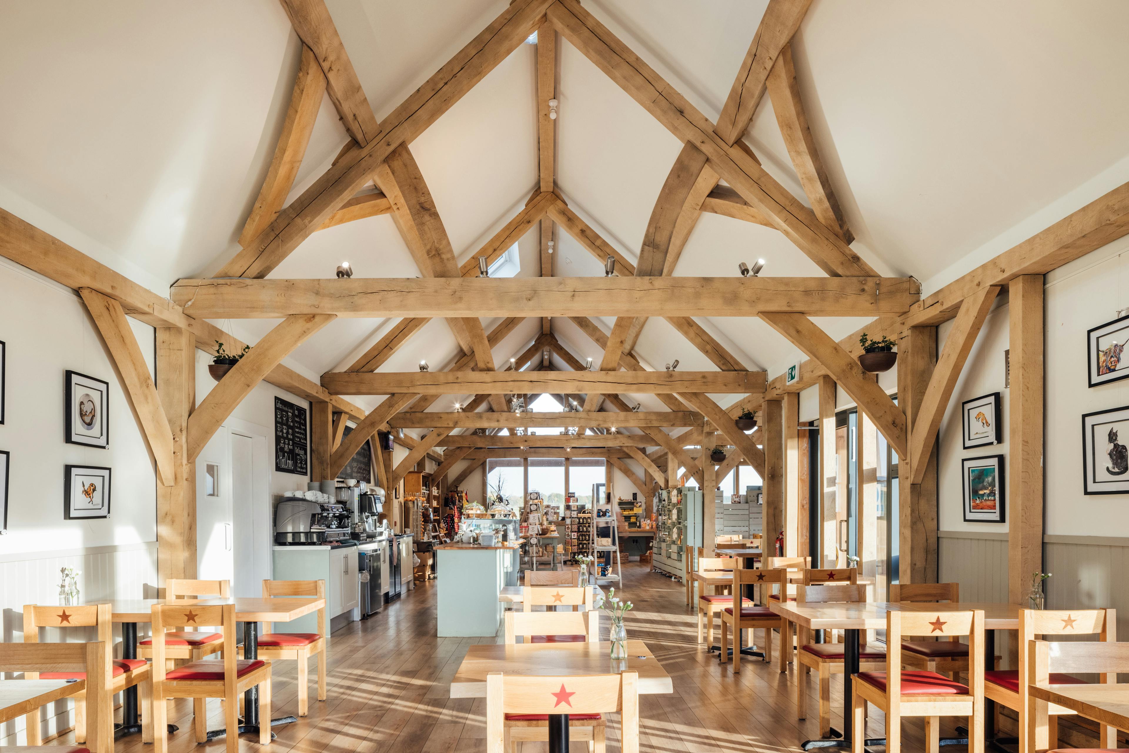 An oak framed cafe with a vaulted ceiling