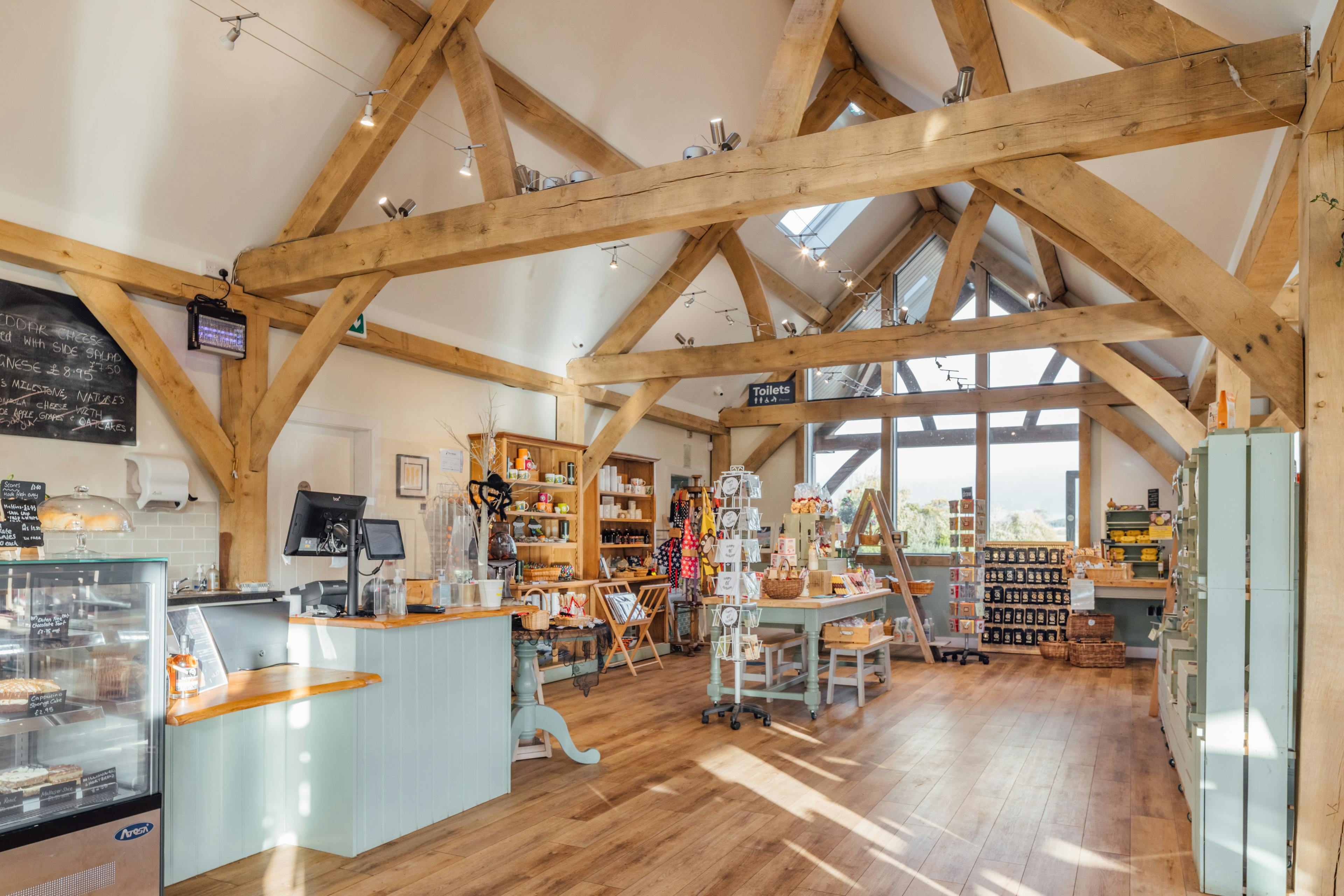 An oak framed farm shop with a vaulted ceiling