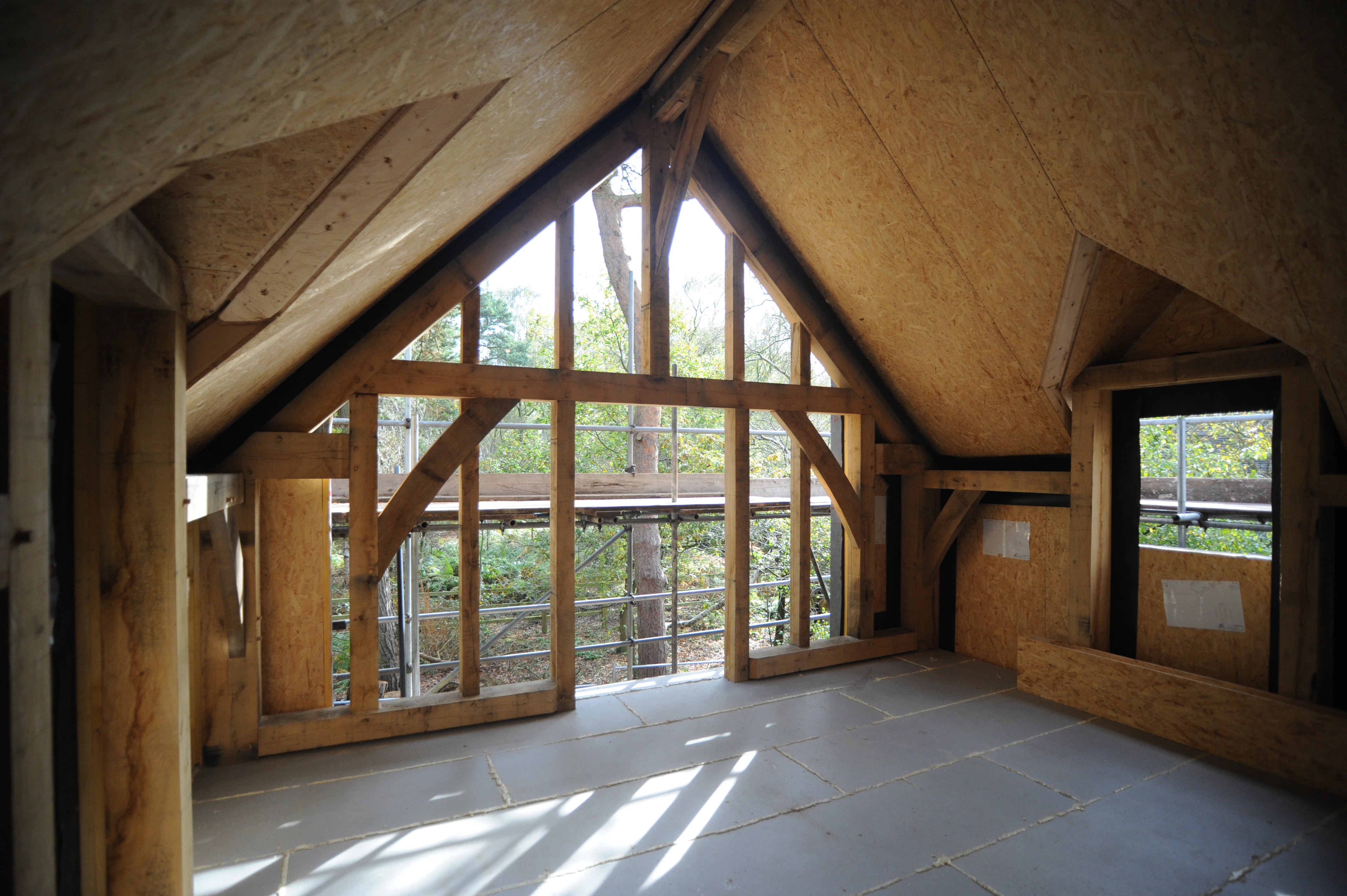 An oak frame with SIPs panels to create walls