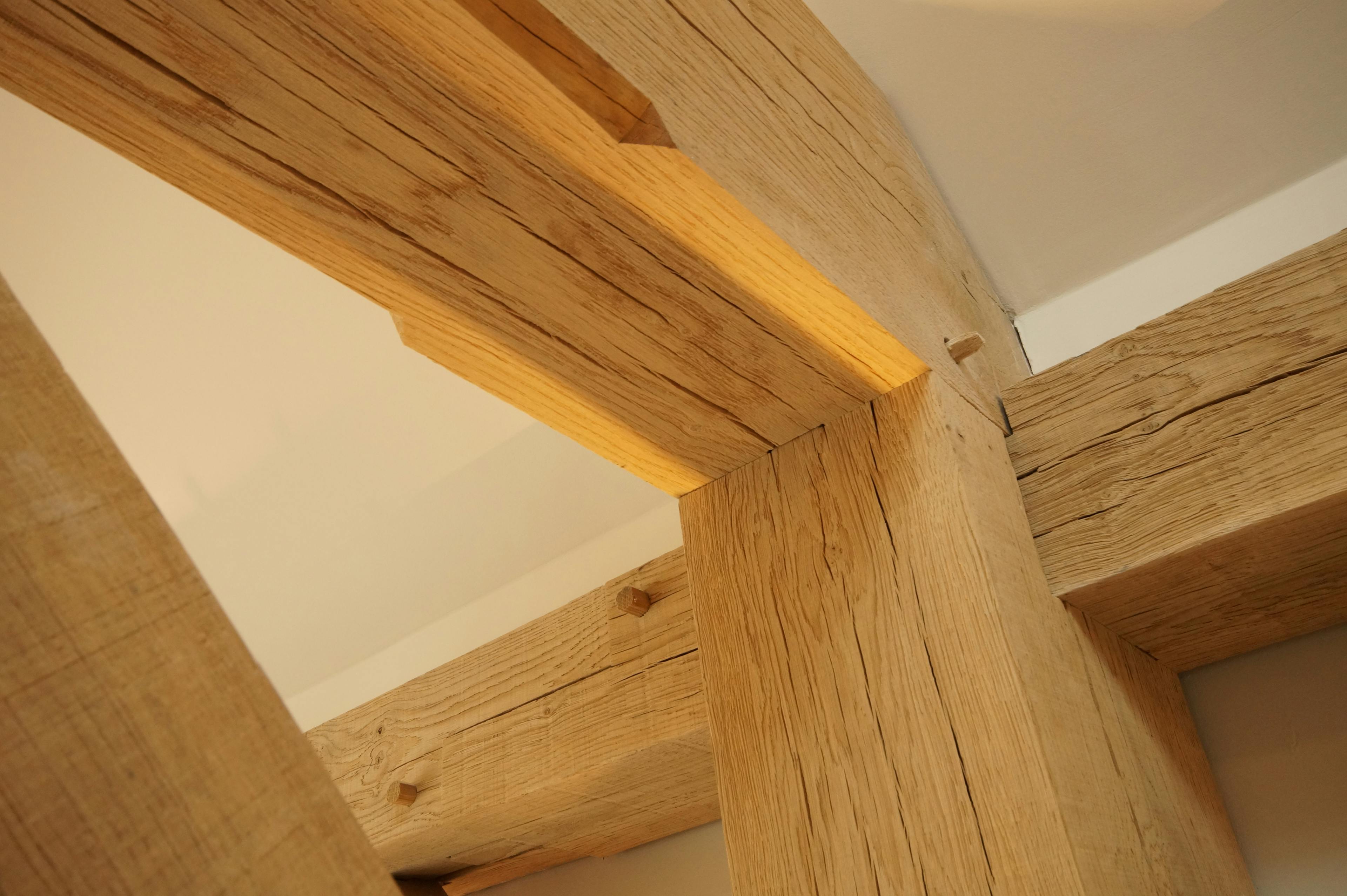 A close up of an oak frame joint