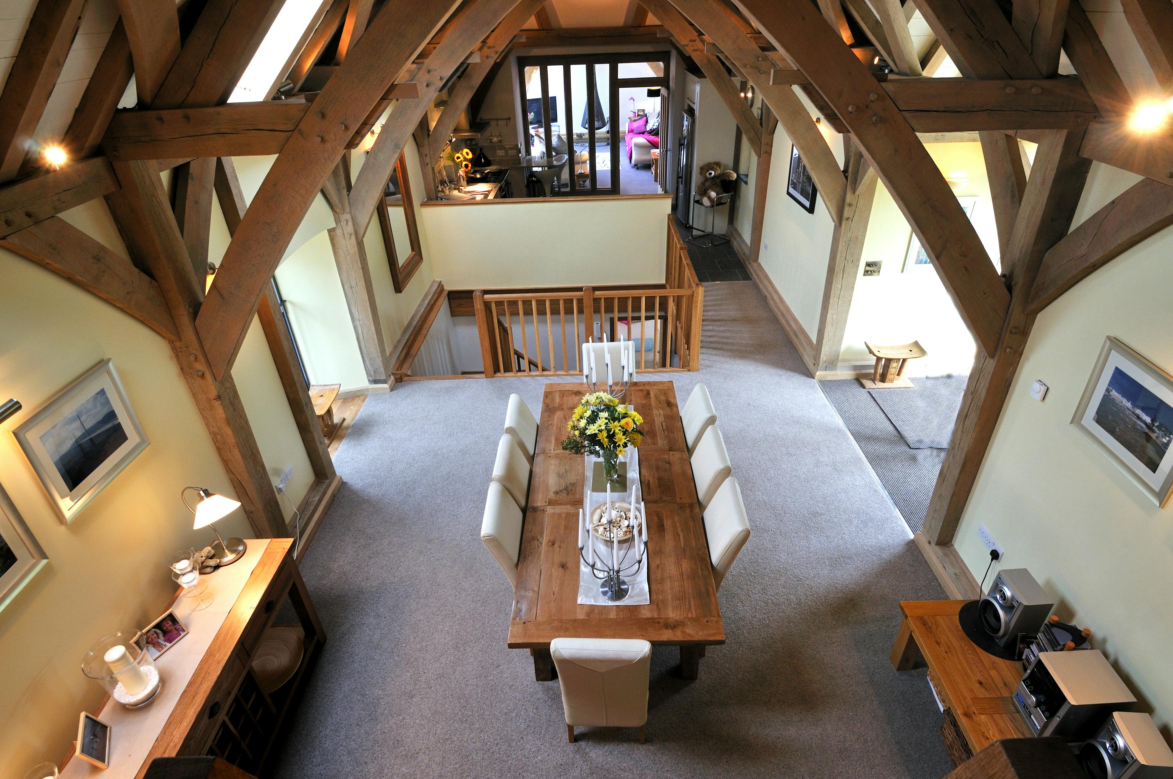 An oak framed open plan dining and living area 