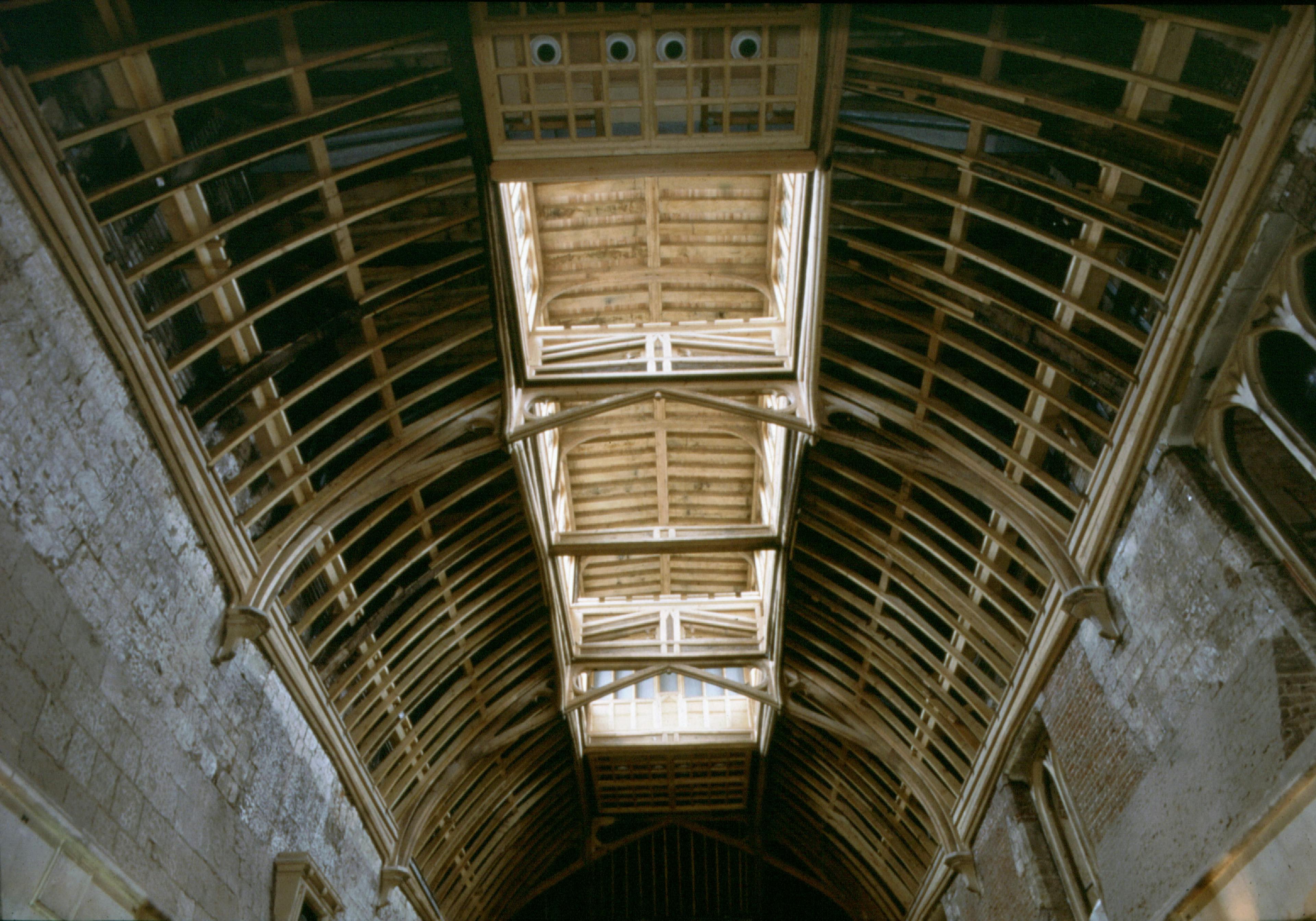 A large timber roof in a old building