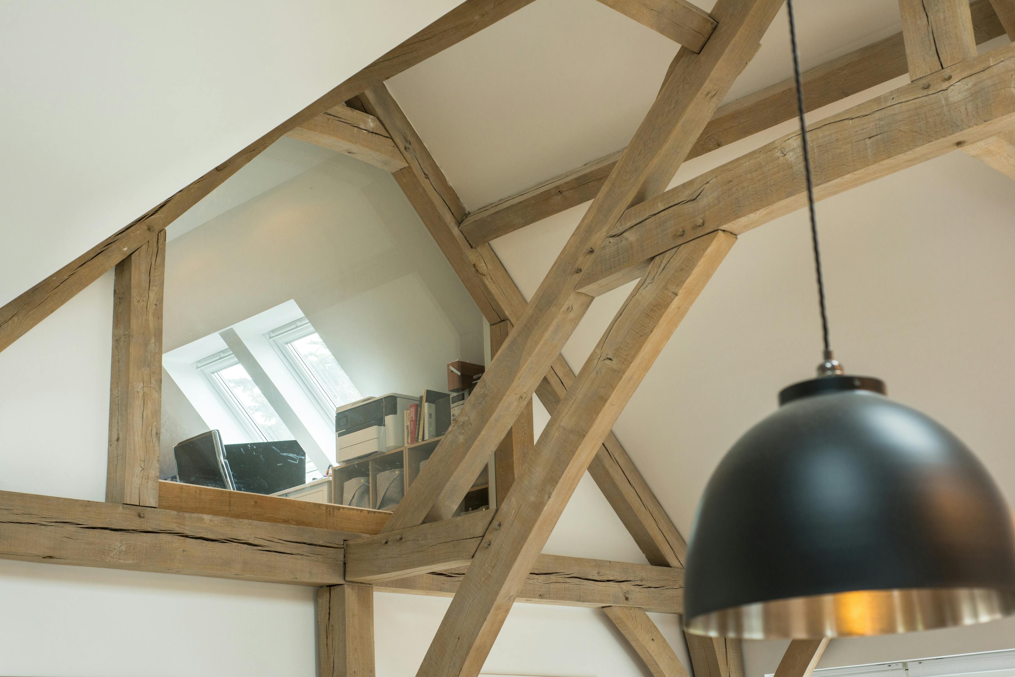 A vaulted oak frame roof with a mezzanine study area