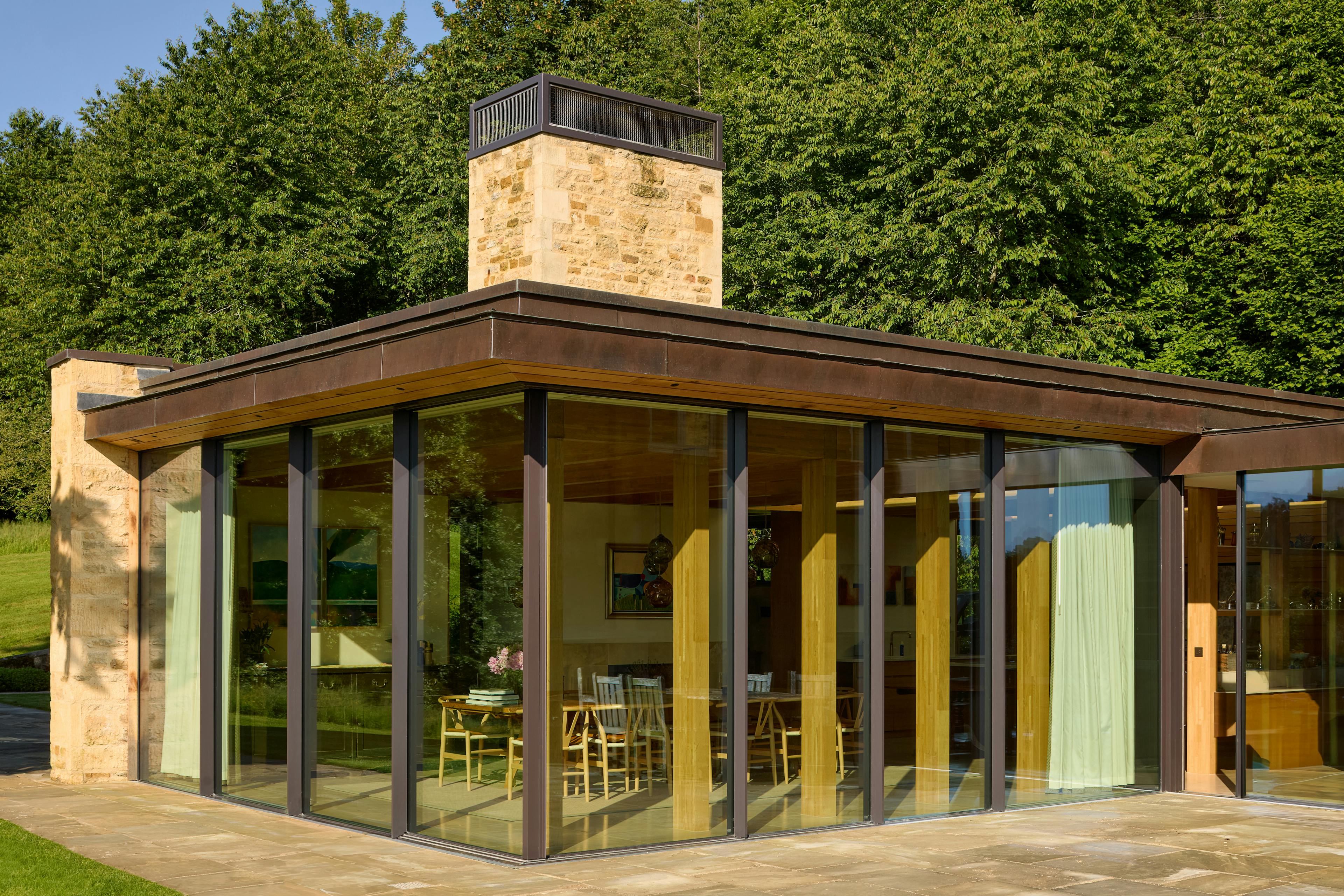 Exterior of an oak glulam extension to a listed manor house