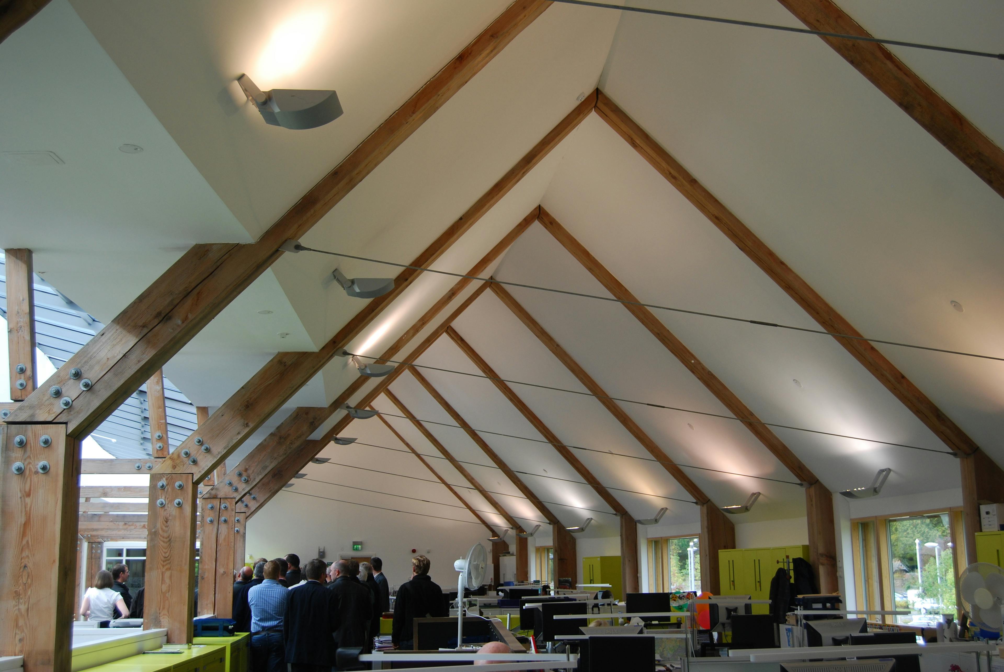 Large A frame Douglas fir posts in a large building with steel bolts and tie rods