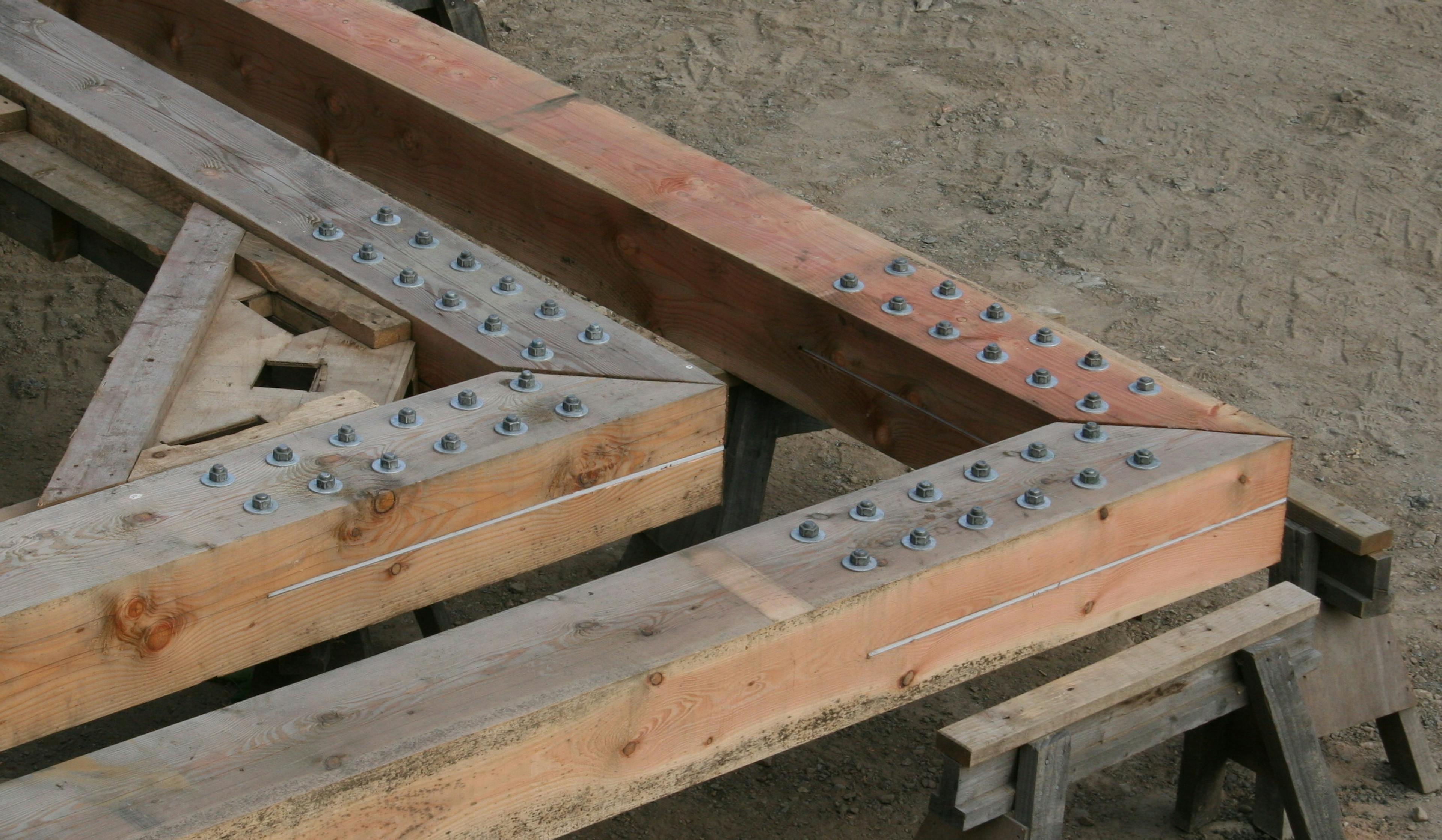 Section of a Douglas fir frame with steel bolts