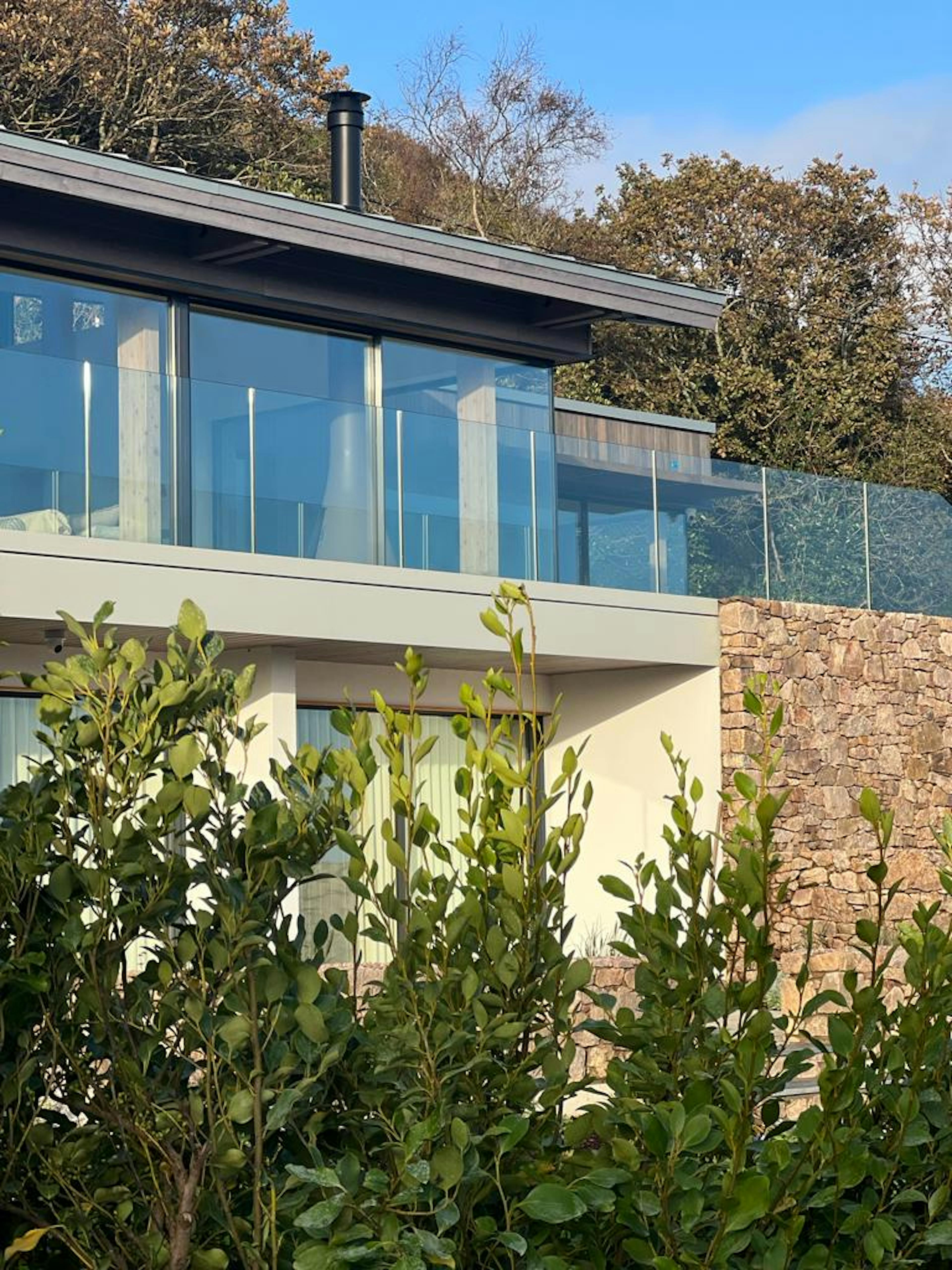 A new build home with a glazed balcony