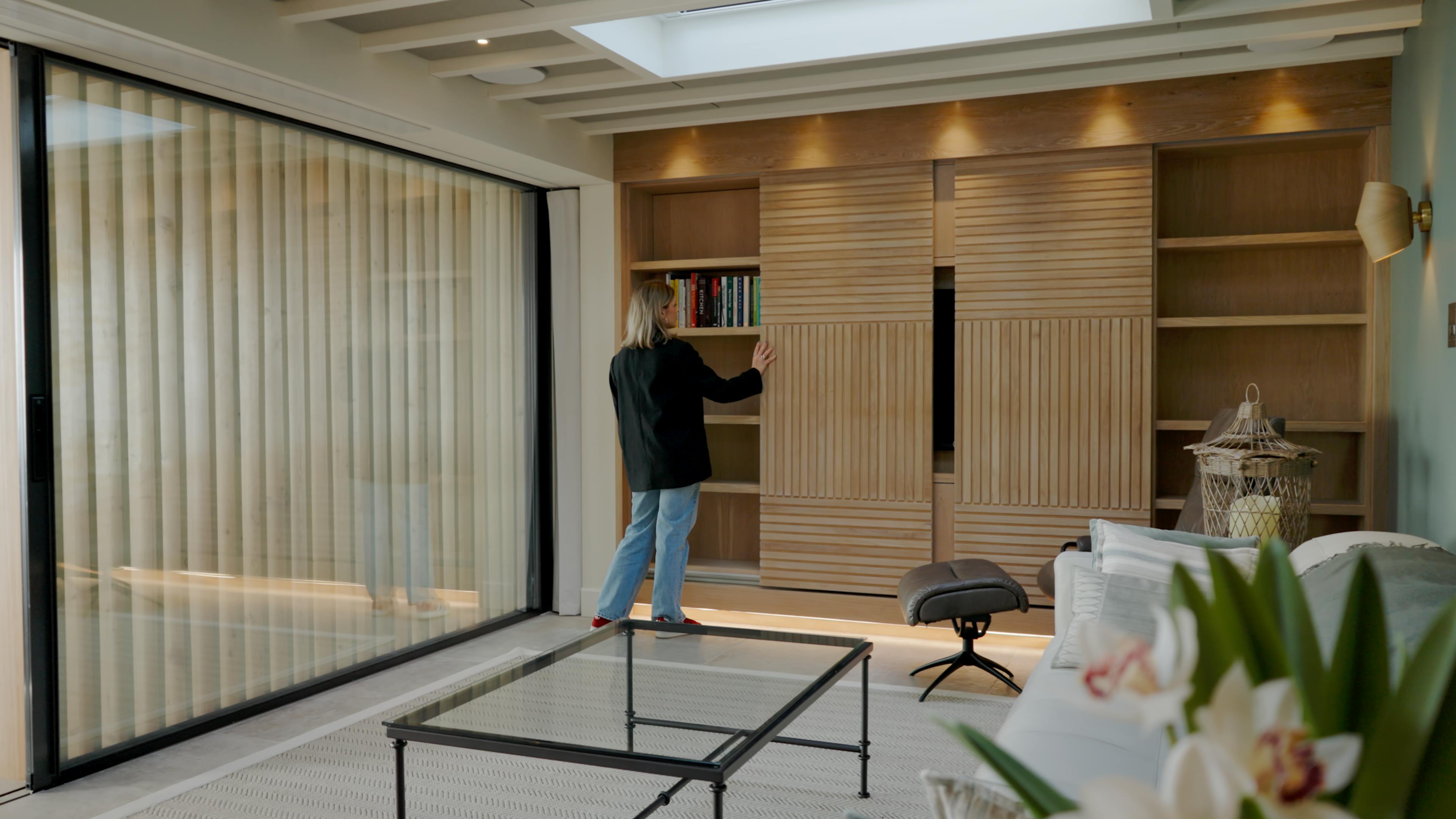 A new build house with bespoke wooden bookshelves