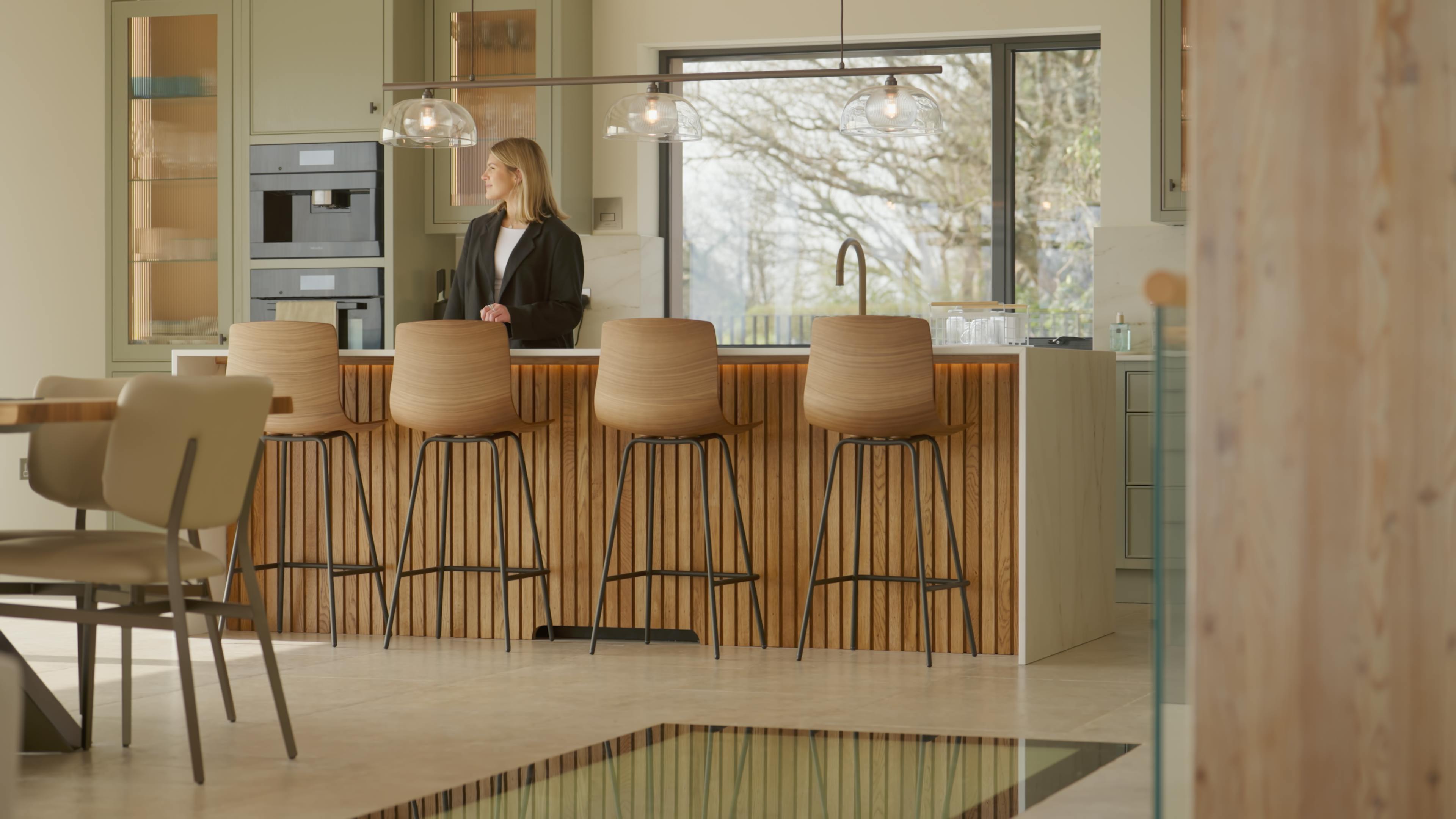 An oak glulam open plan living room with dining and kitchen area