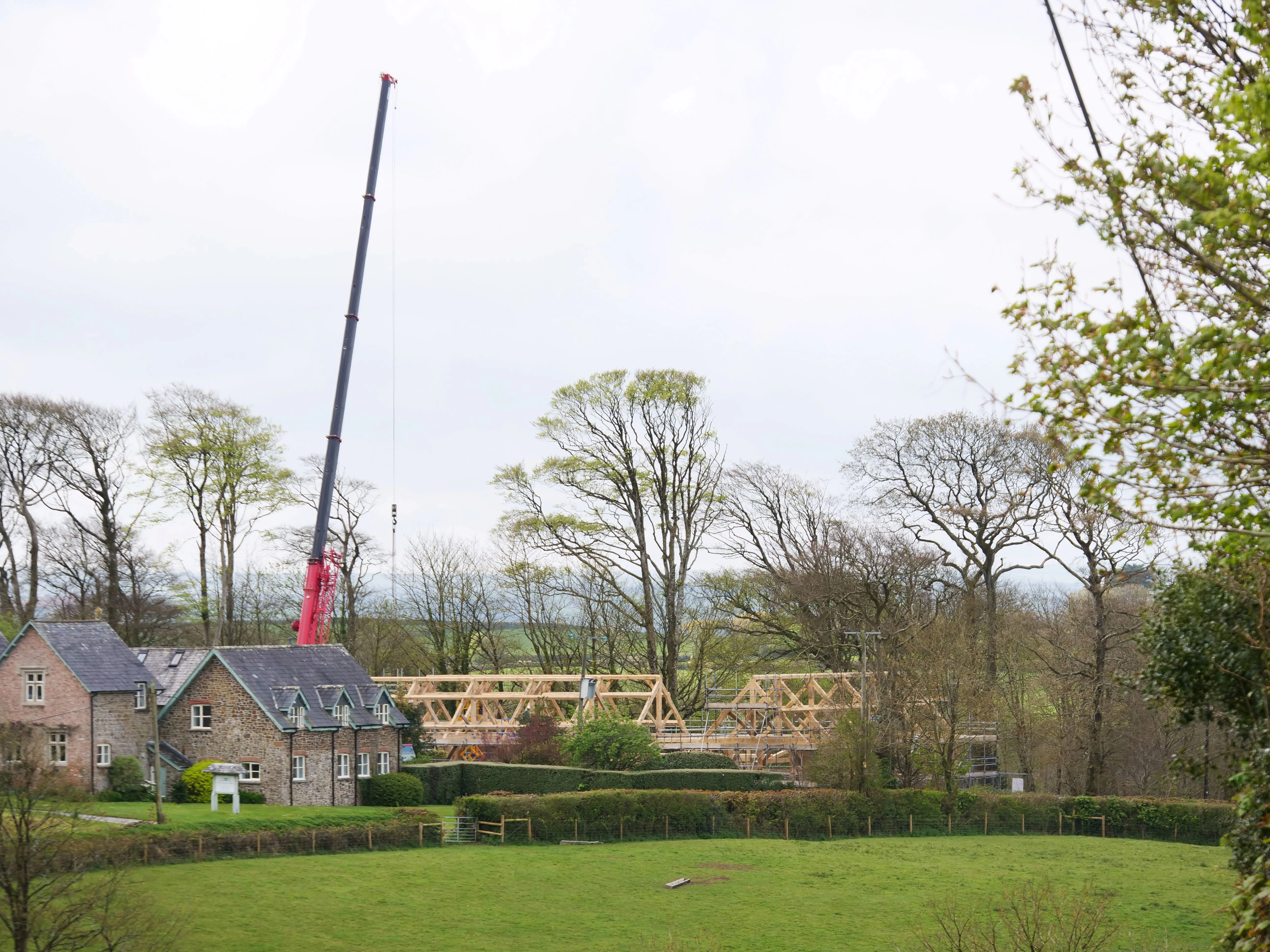 An oak frame for a wedding barn during installation