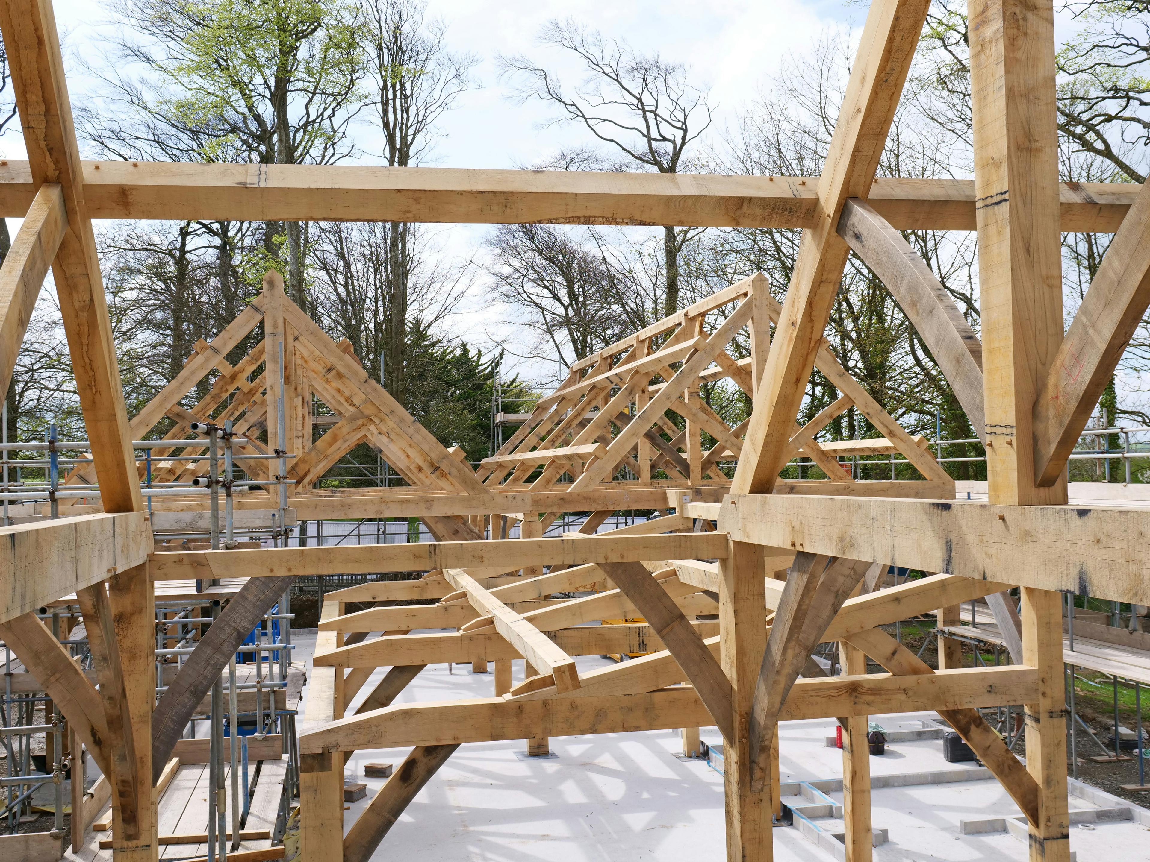 An oak frame for a wedding barn during installation