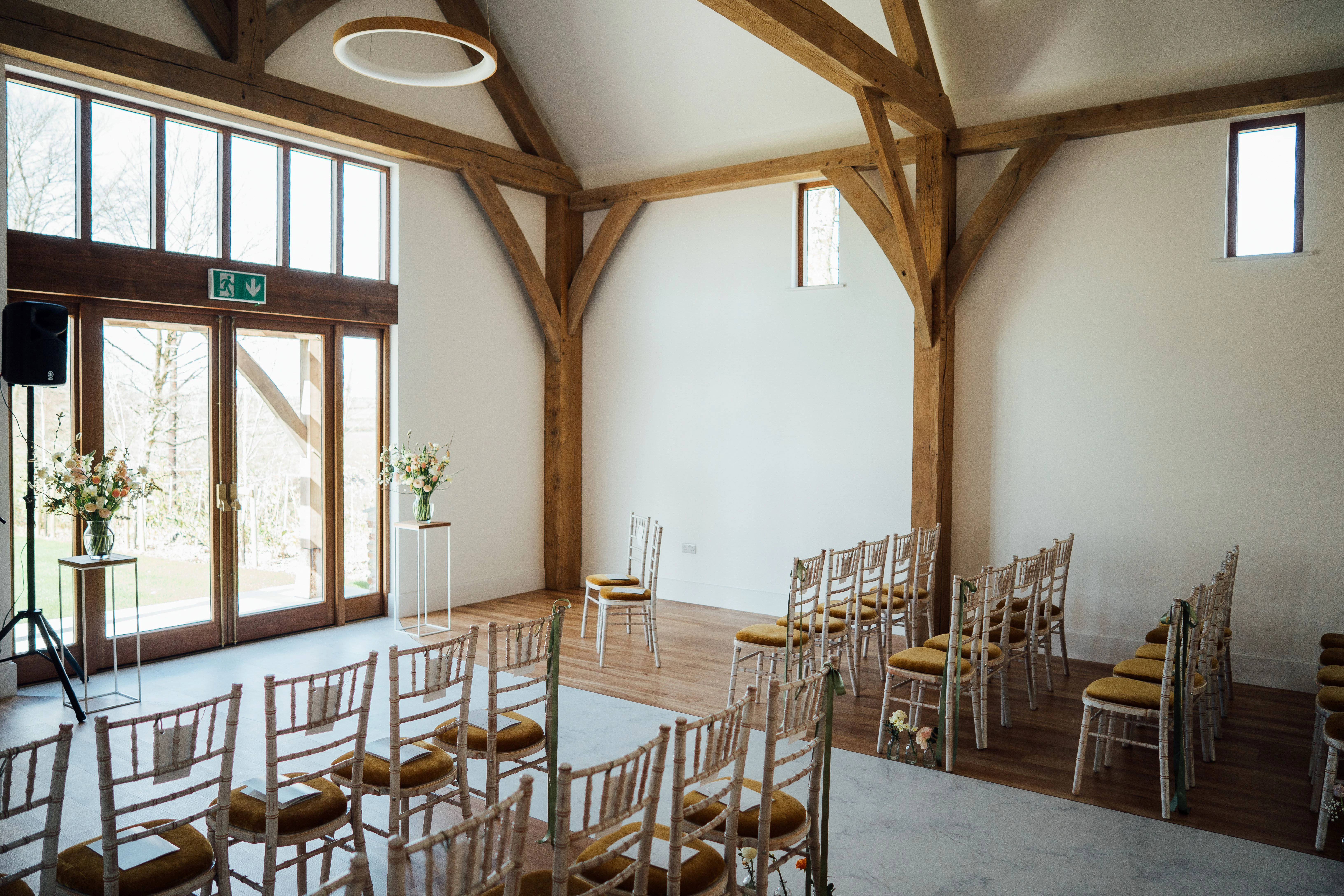 The ceremony room in an oak framed wedding barn 
