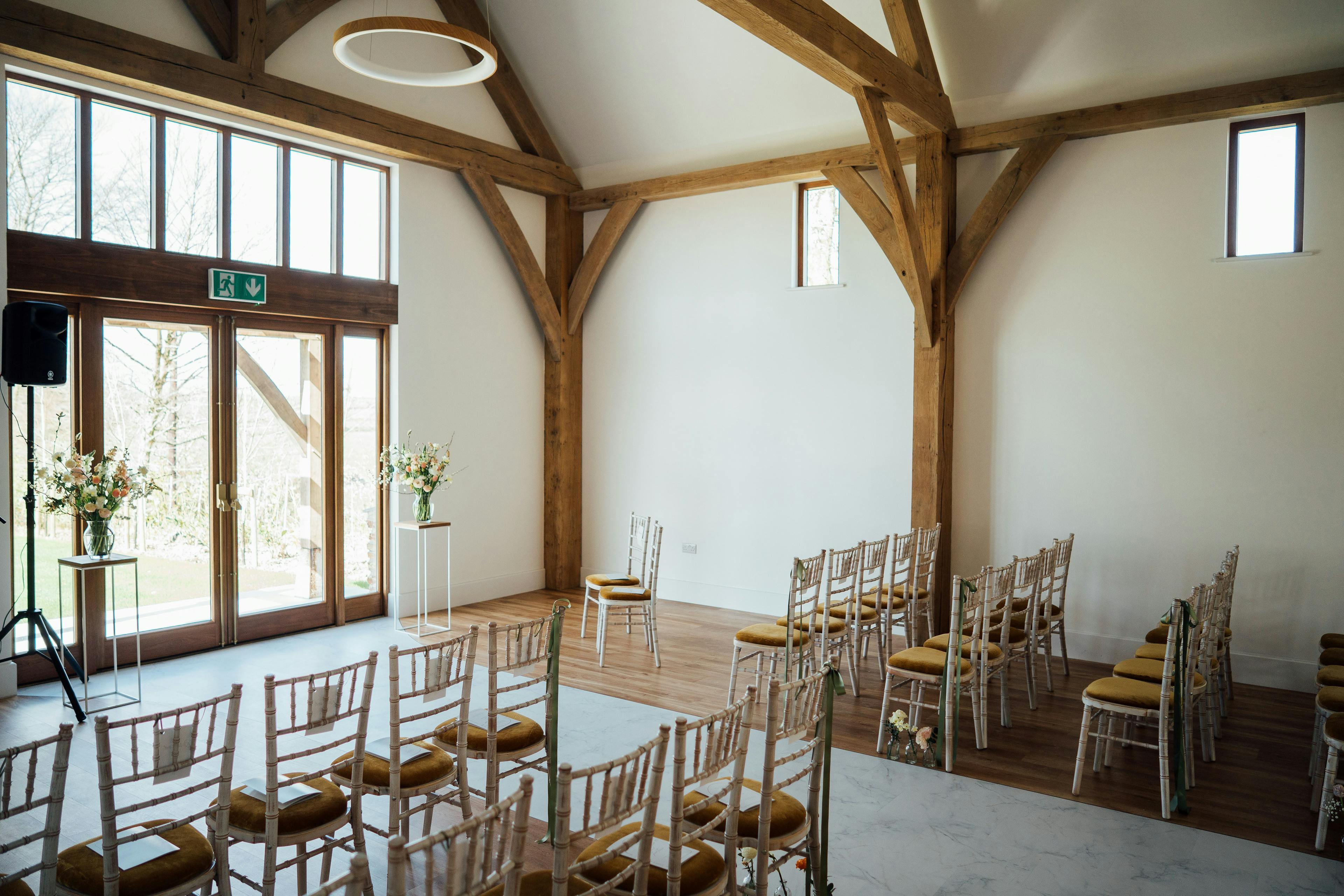 The ceremony room in an oak framed wedding barn 