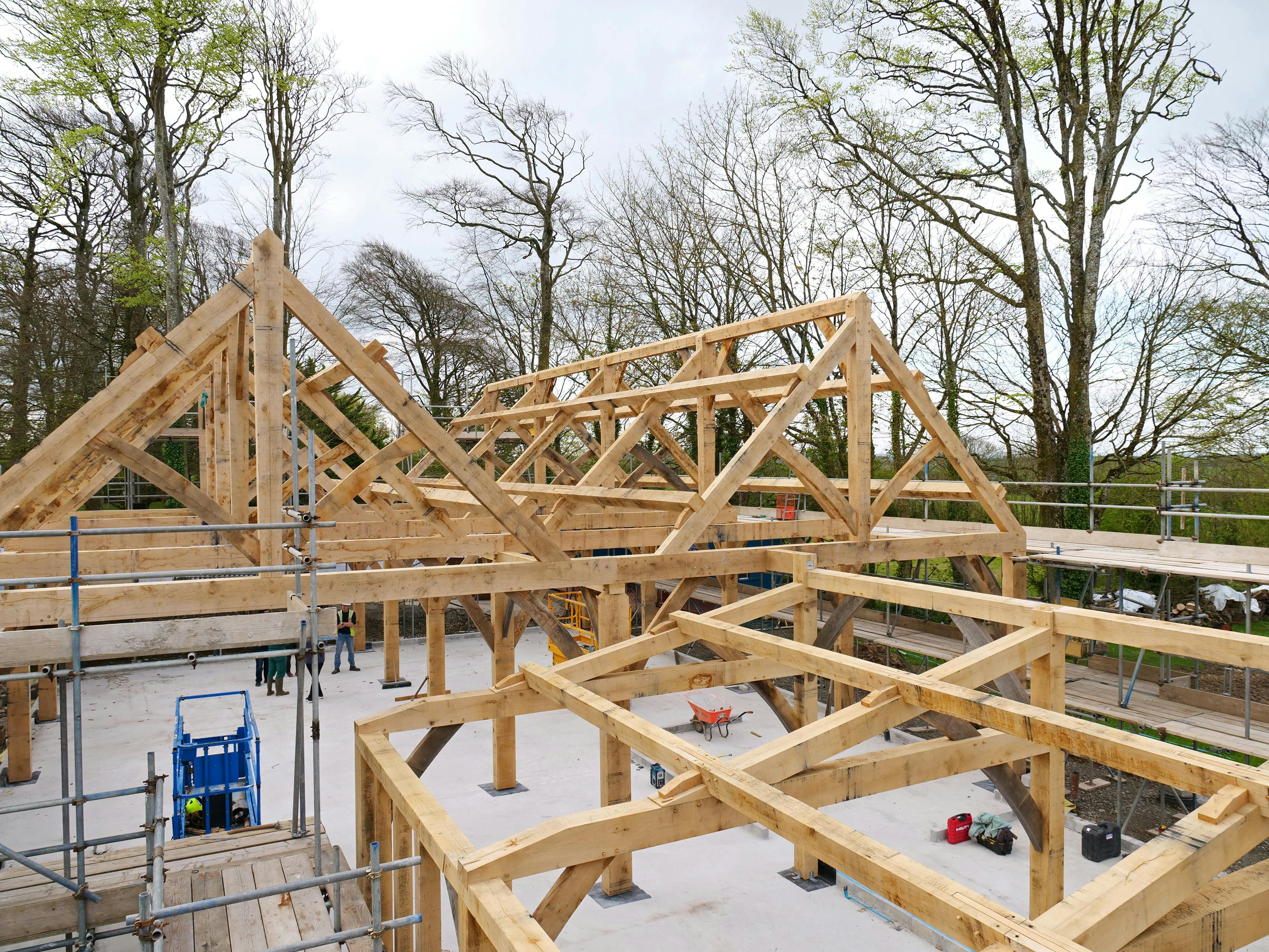 An oak frame for a wedding barn during installation