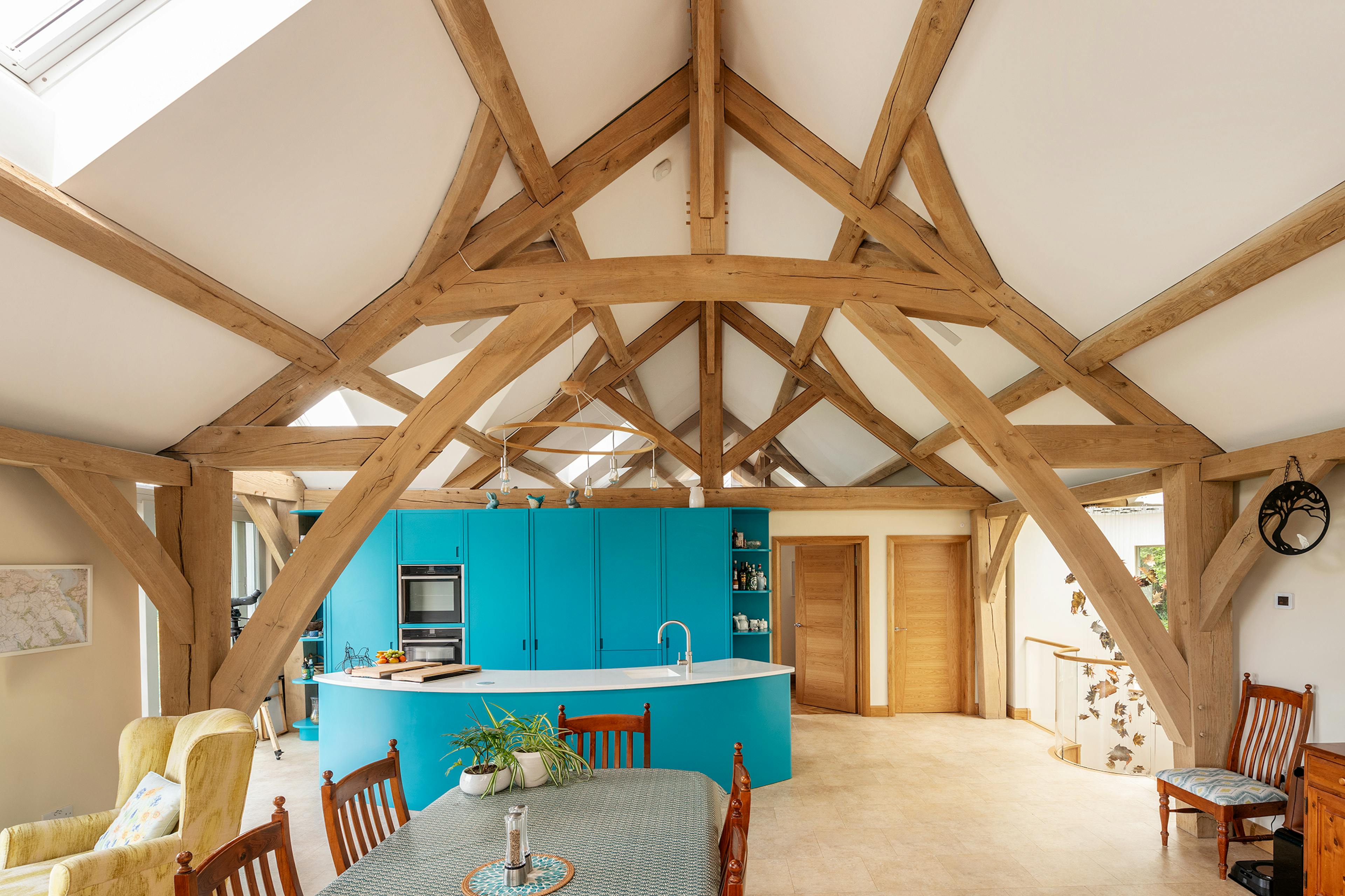 A vaulted ceiling in an oak framed open plan kitchen and dining room