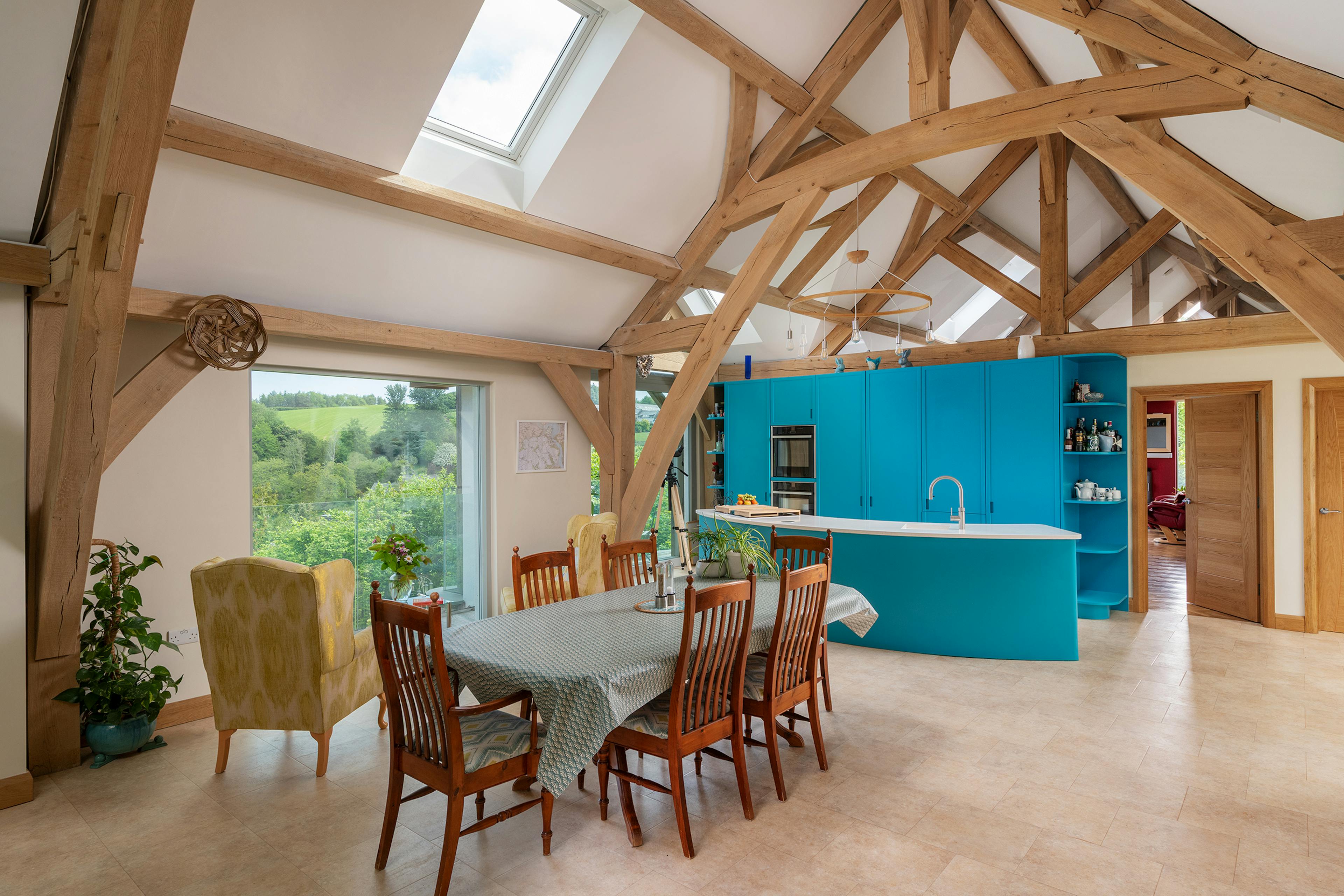 A vaulted ceiling in an oak framed open plan kitchen and dining room