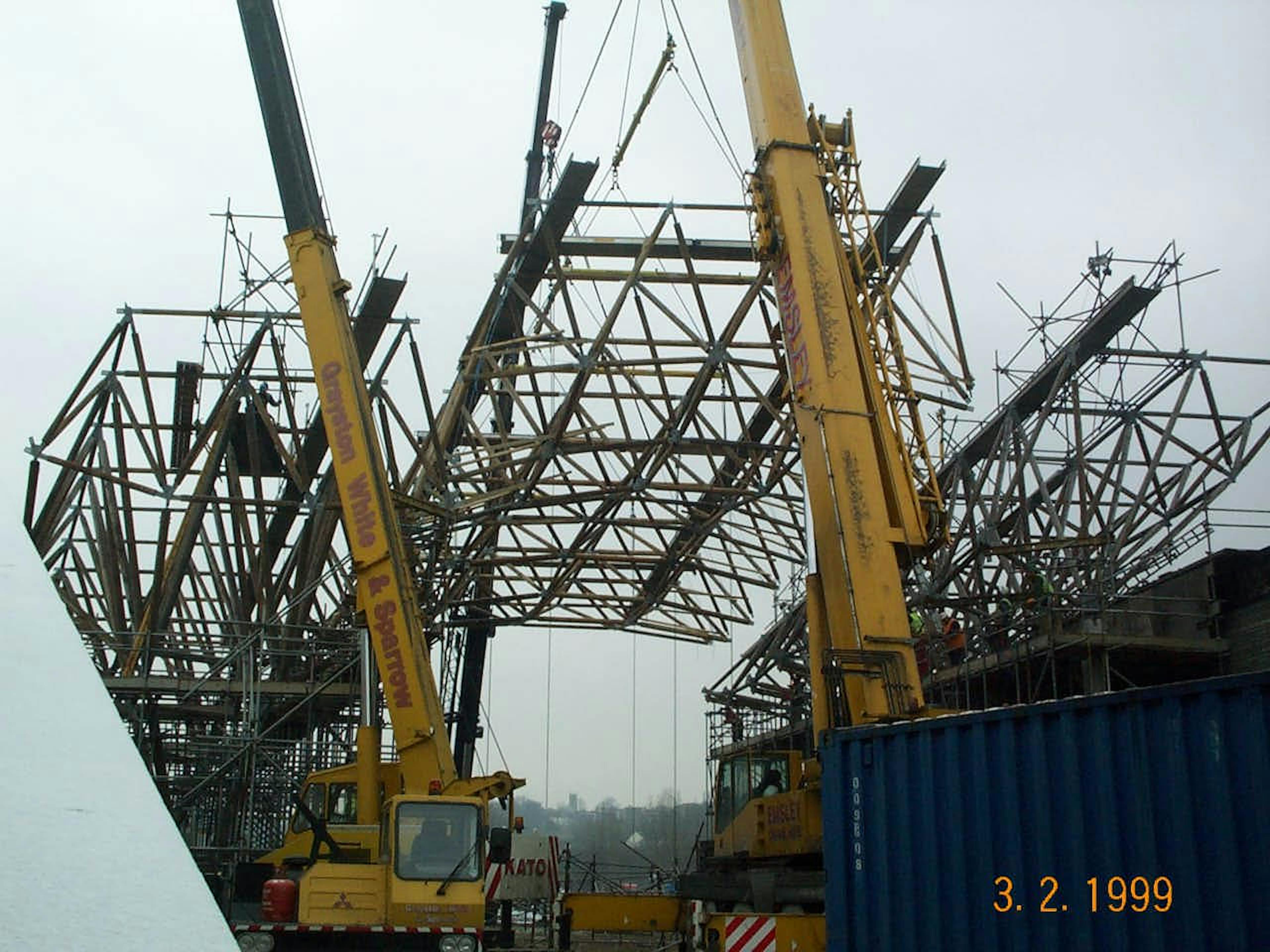 Crane lifting timber components at the Earth Centre construction site in Doncaster