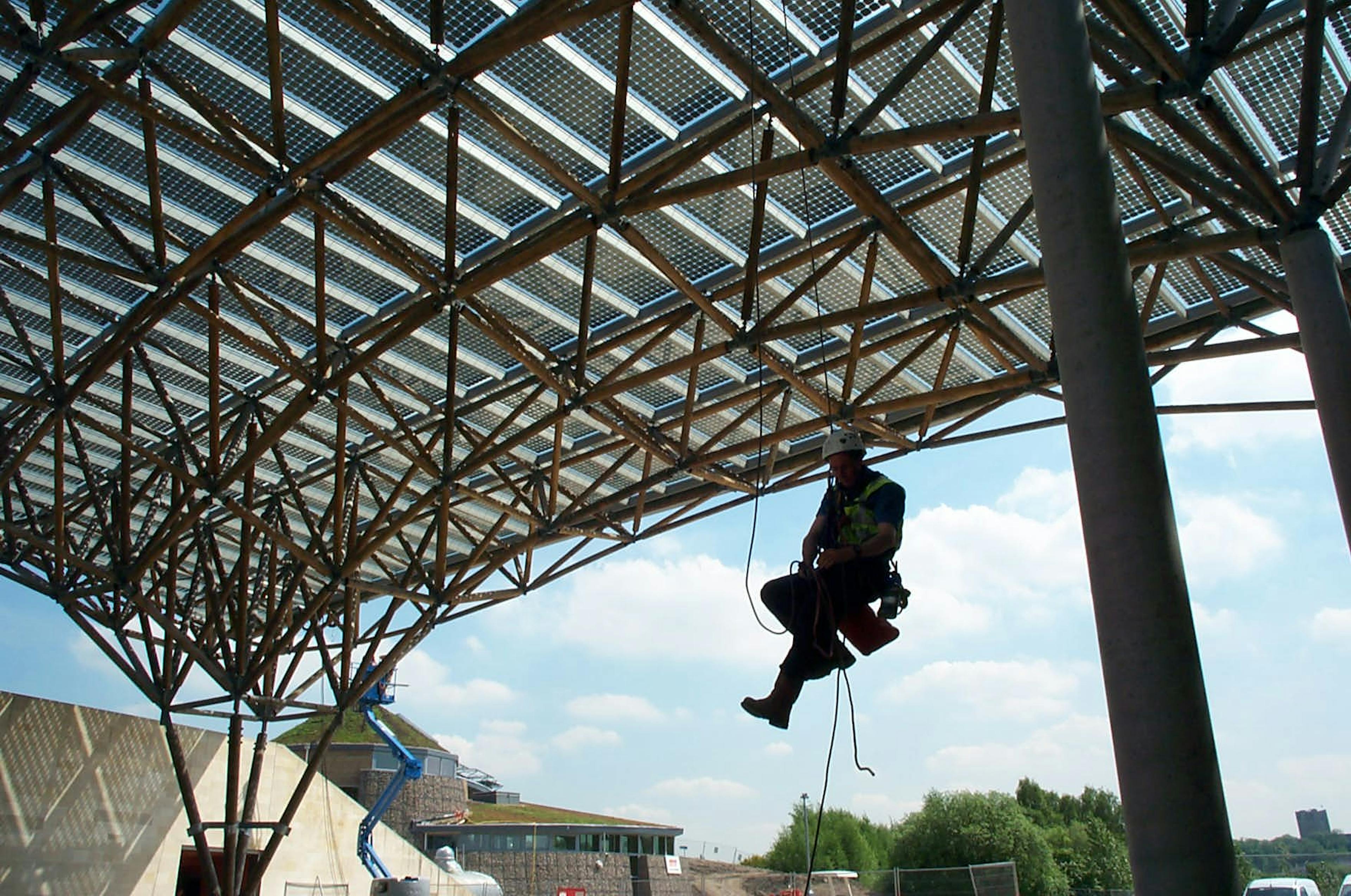 On-site carpenter and crane involved in assembling the solar canopy at Doncaster’s Earth Centre