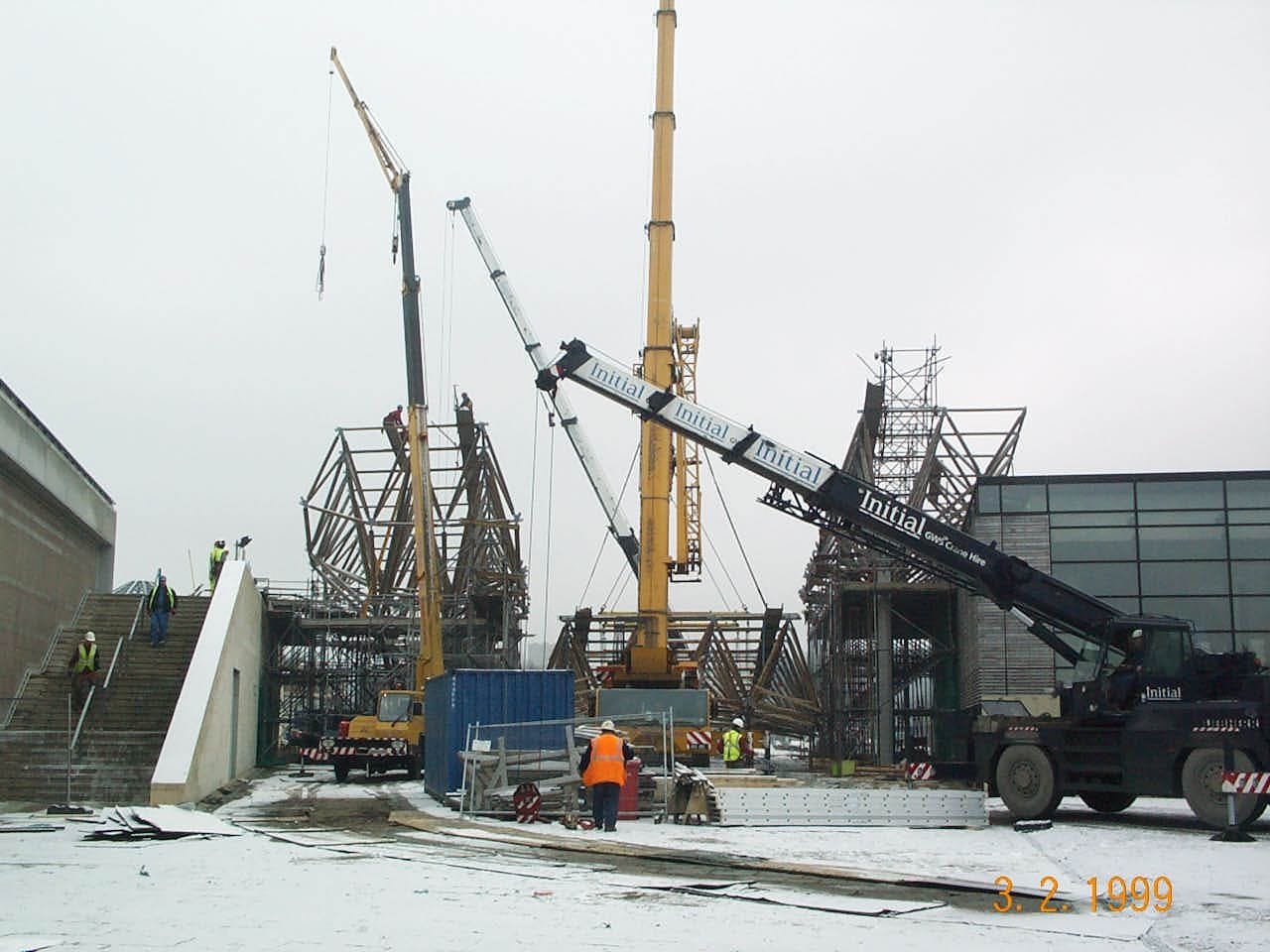 Snow-covered construction site with crane assembling solar canopy at Doncaster’s Earth Centre