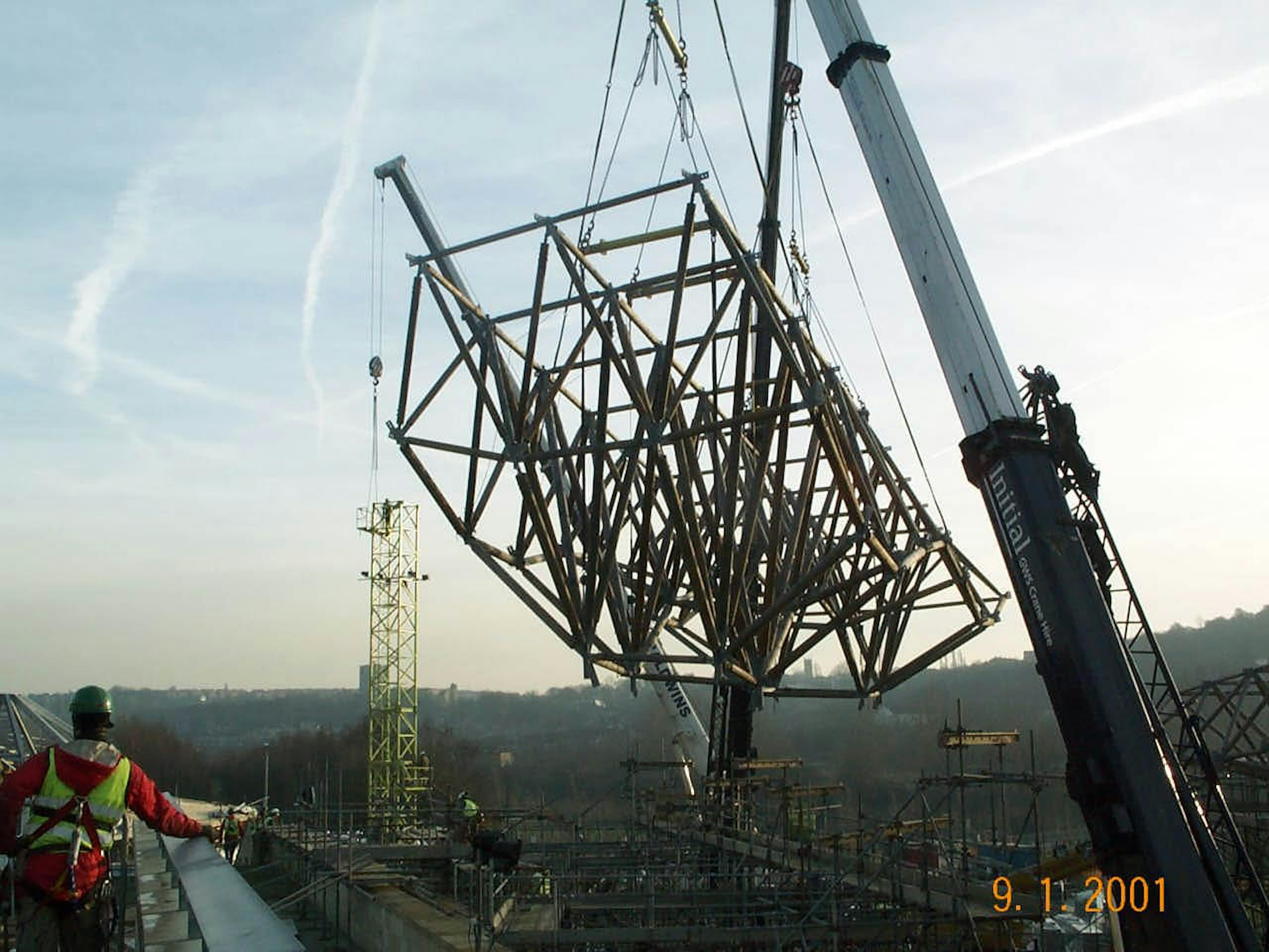 Construction crew erecting solar canopy framework at the Earth Centre, Doncaster