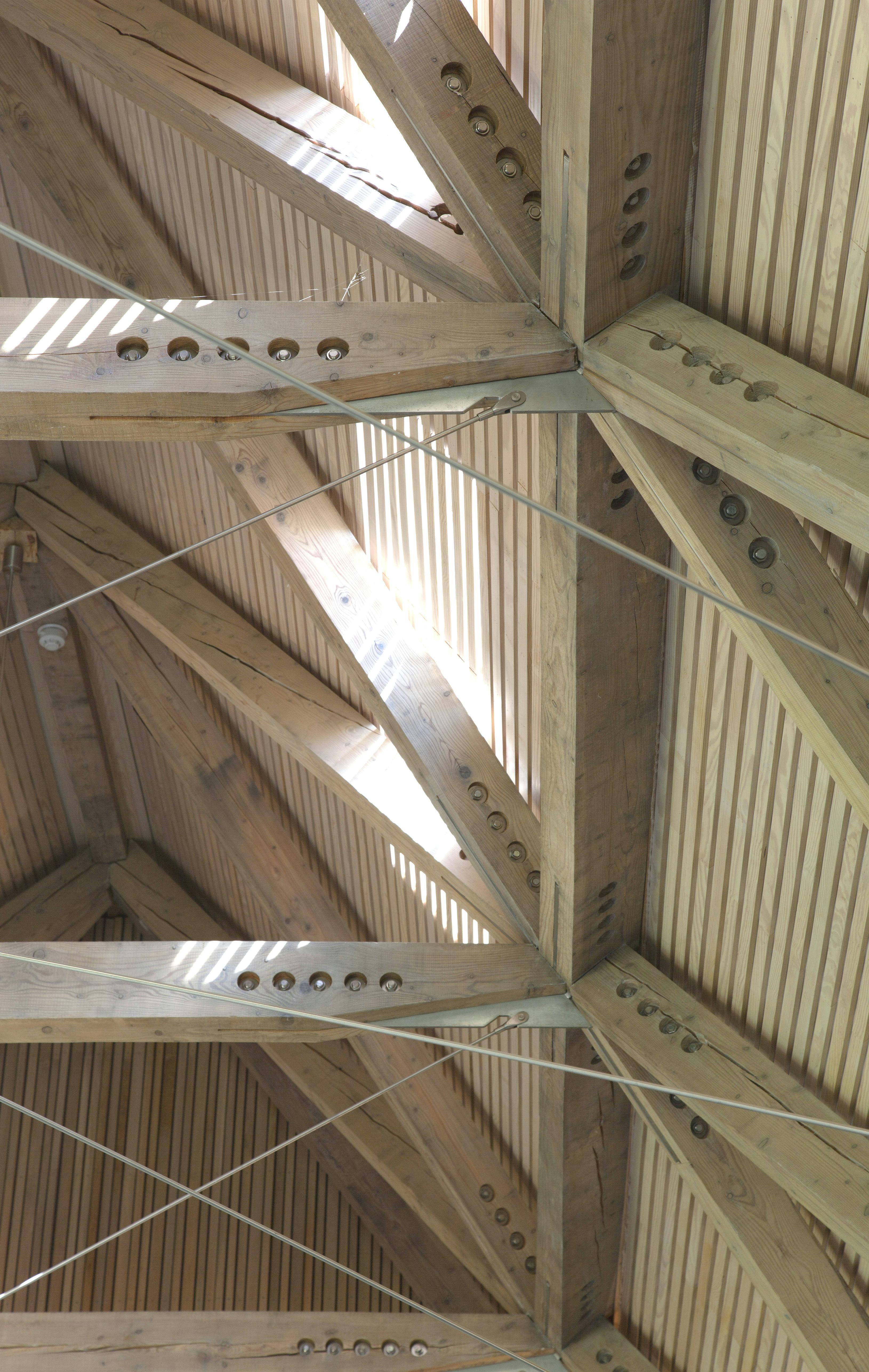 A visitors centre with a diagrid roof constructed from larch