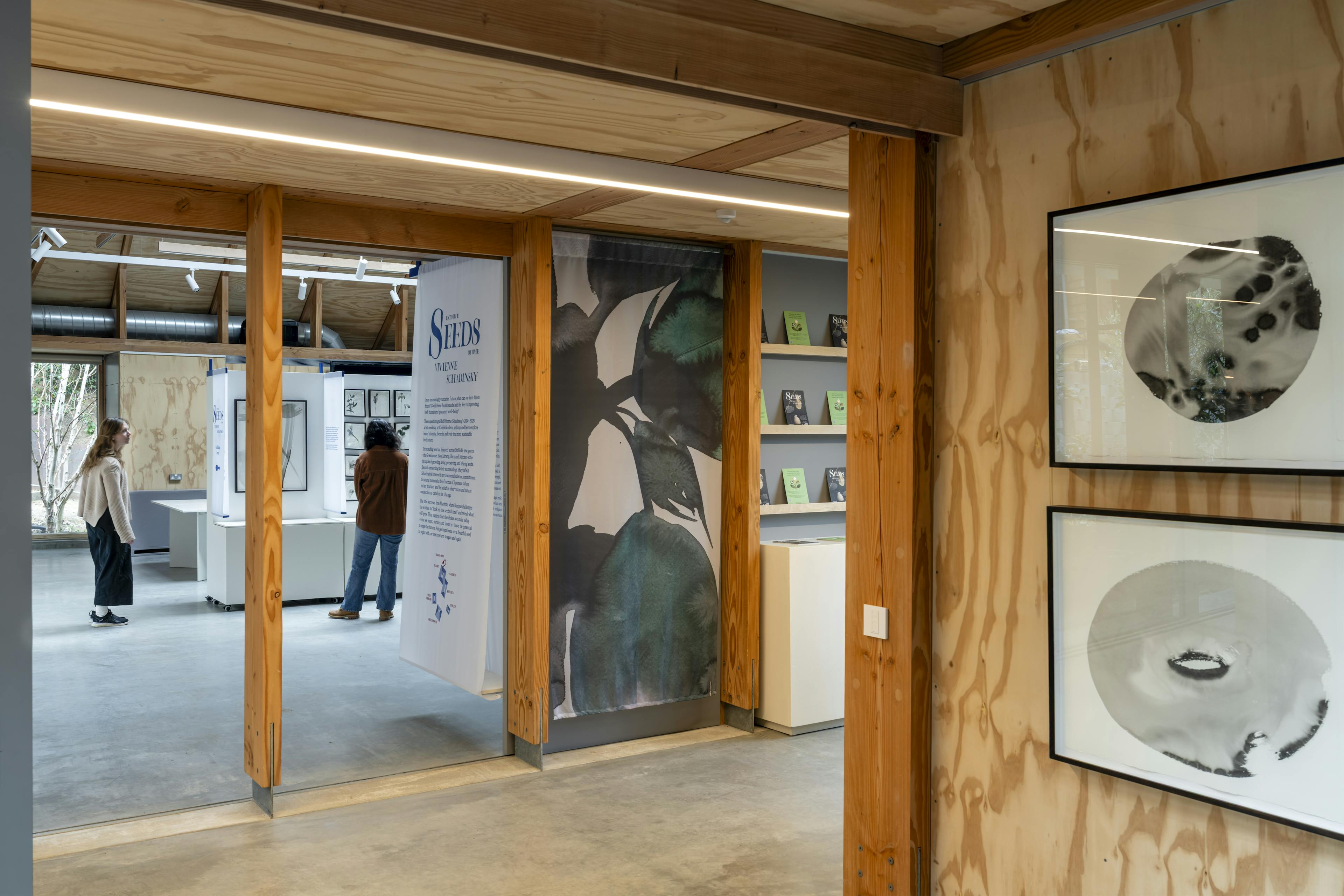 Interior of a Douglas fir-framed event seminar space, featuring exposed timber beams and natural lighting
