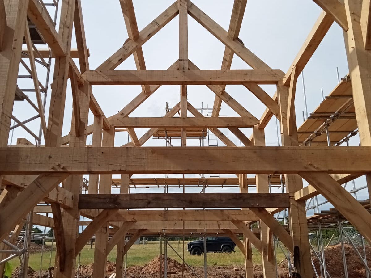 The trusses on an oak frame home during construction