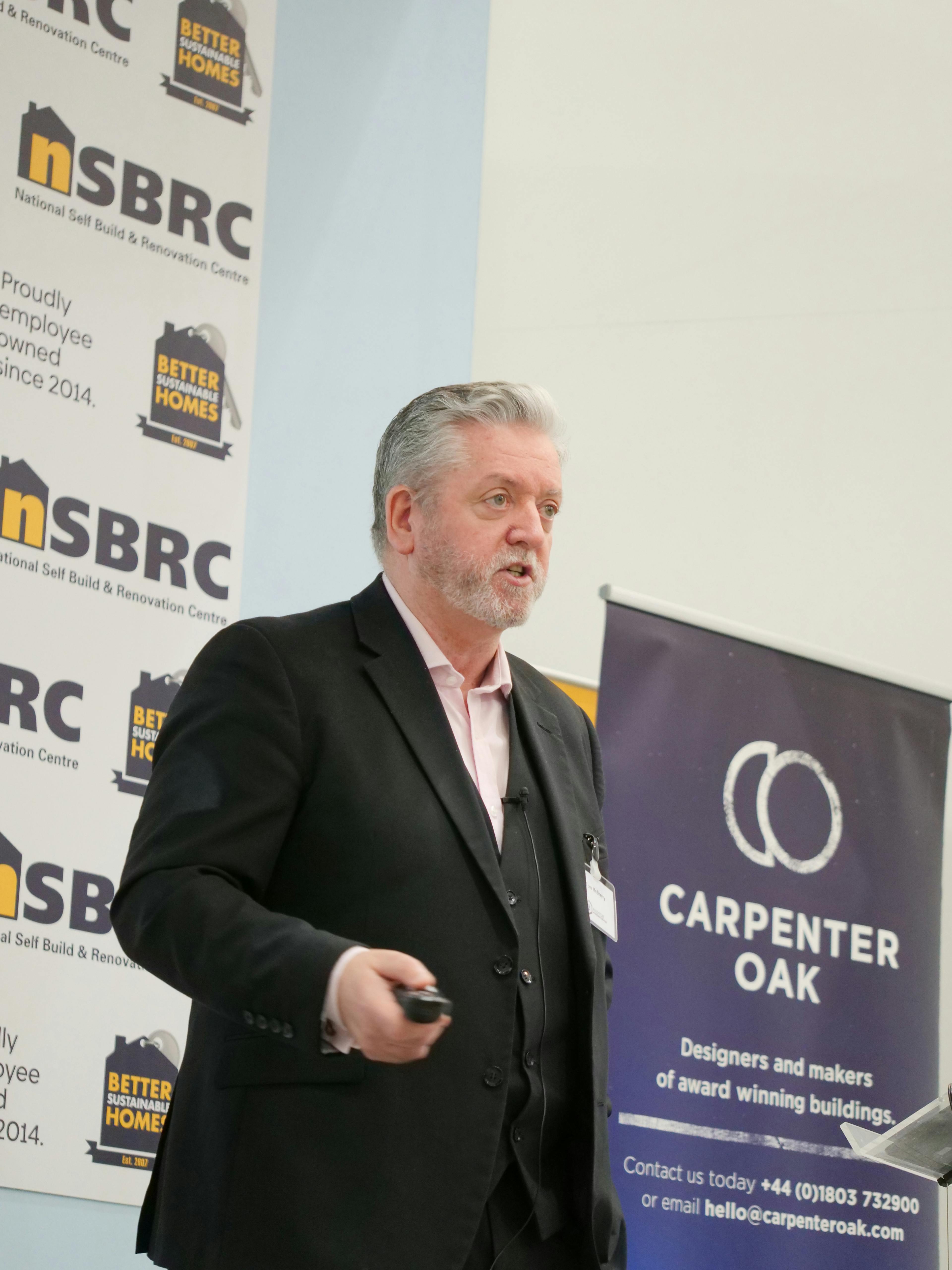 A presenter on a stage