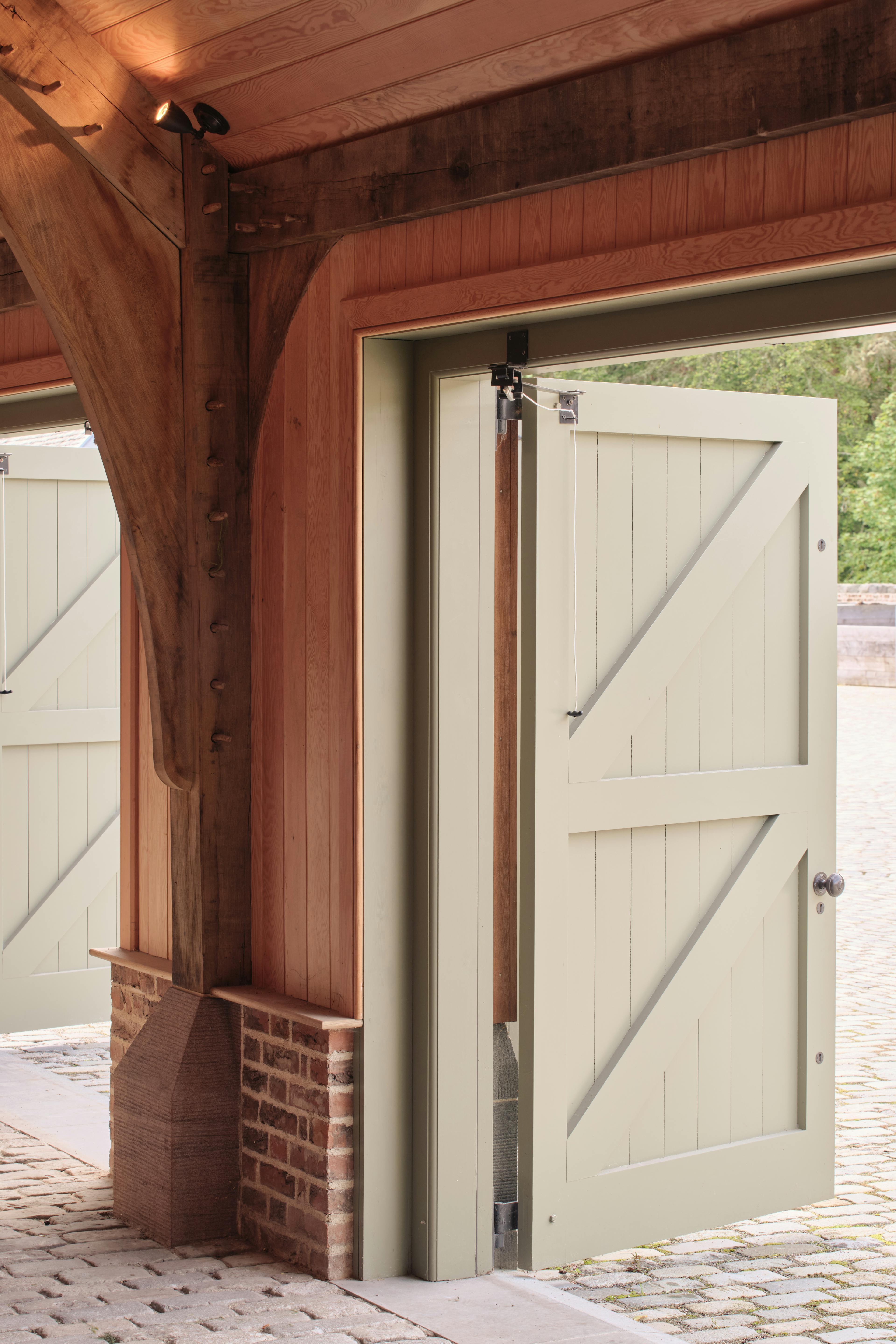 Interior of the Home Farm Barns at the Aldourie Estate, showing an integrated staddlestone fixing within the wall construction